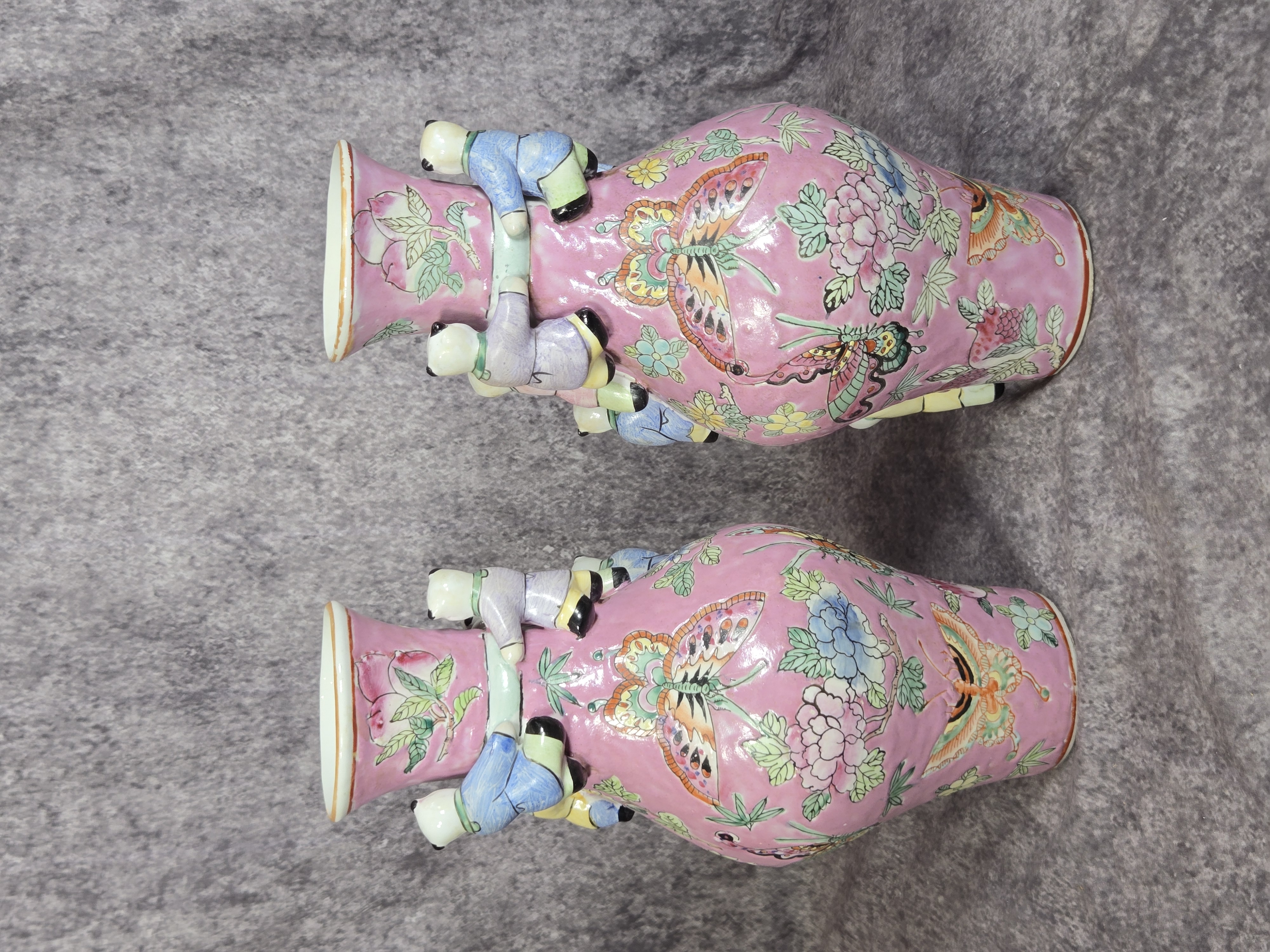 A Pair of Chinese Polychrome Porcelain Fertility Vases