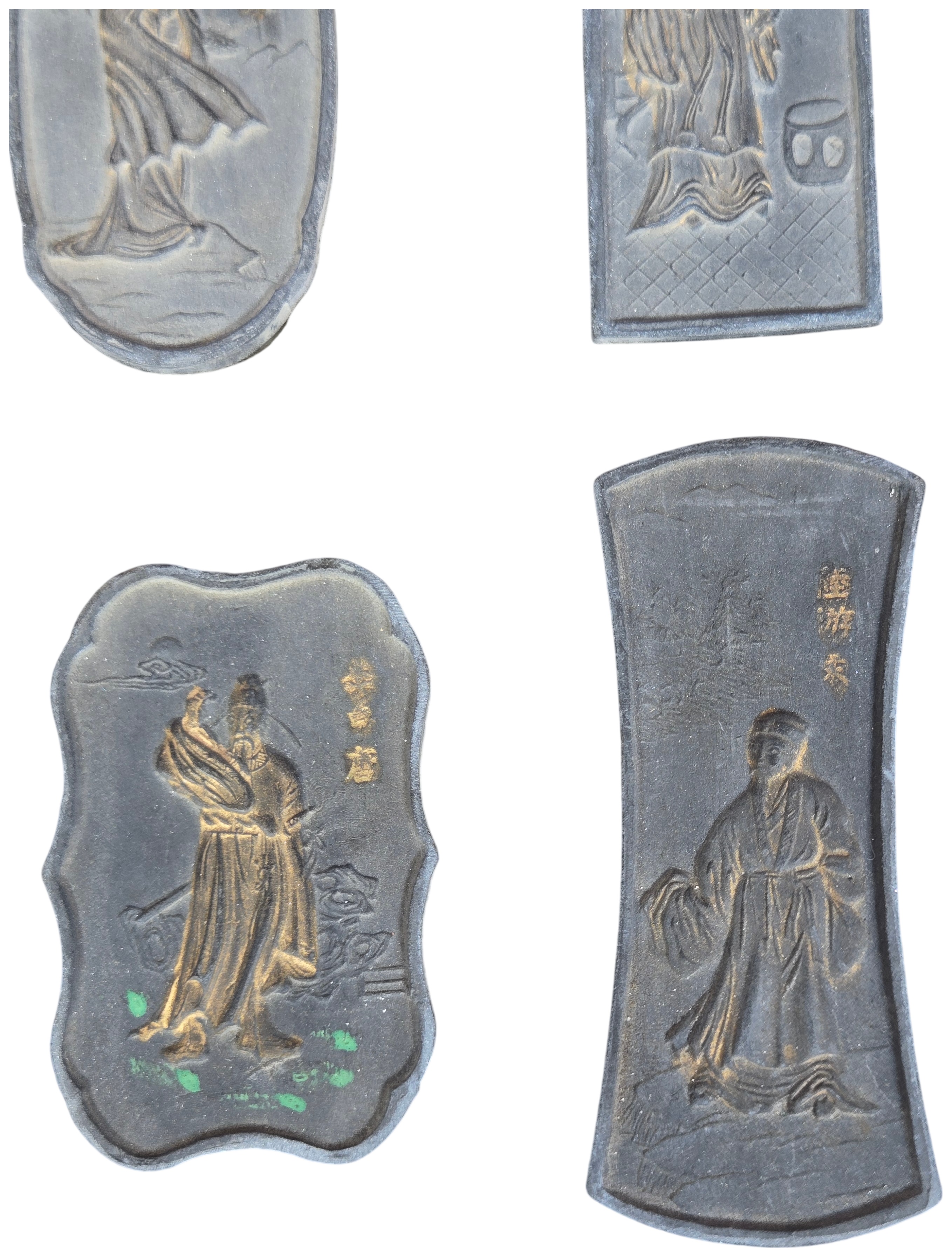 A Set of Nine Chinese Gilt and Polychrome Molded Inksticks