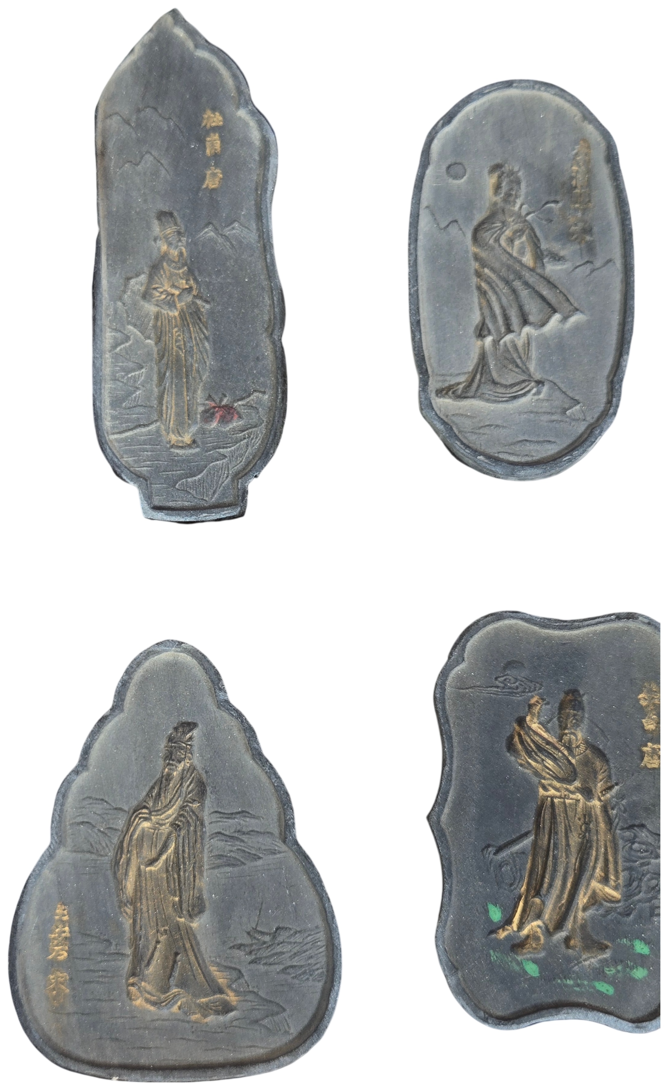 A Set of Nine Chinese Gilt and Polychrome Molded Inksticks