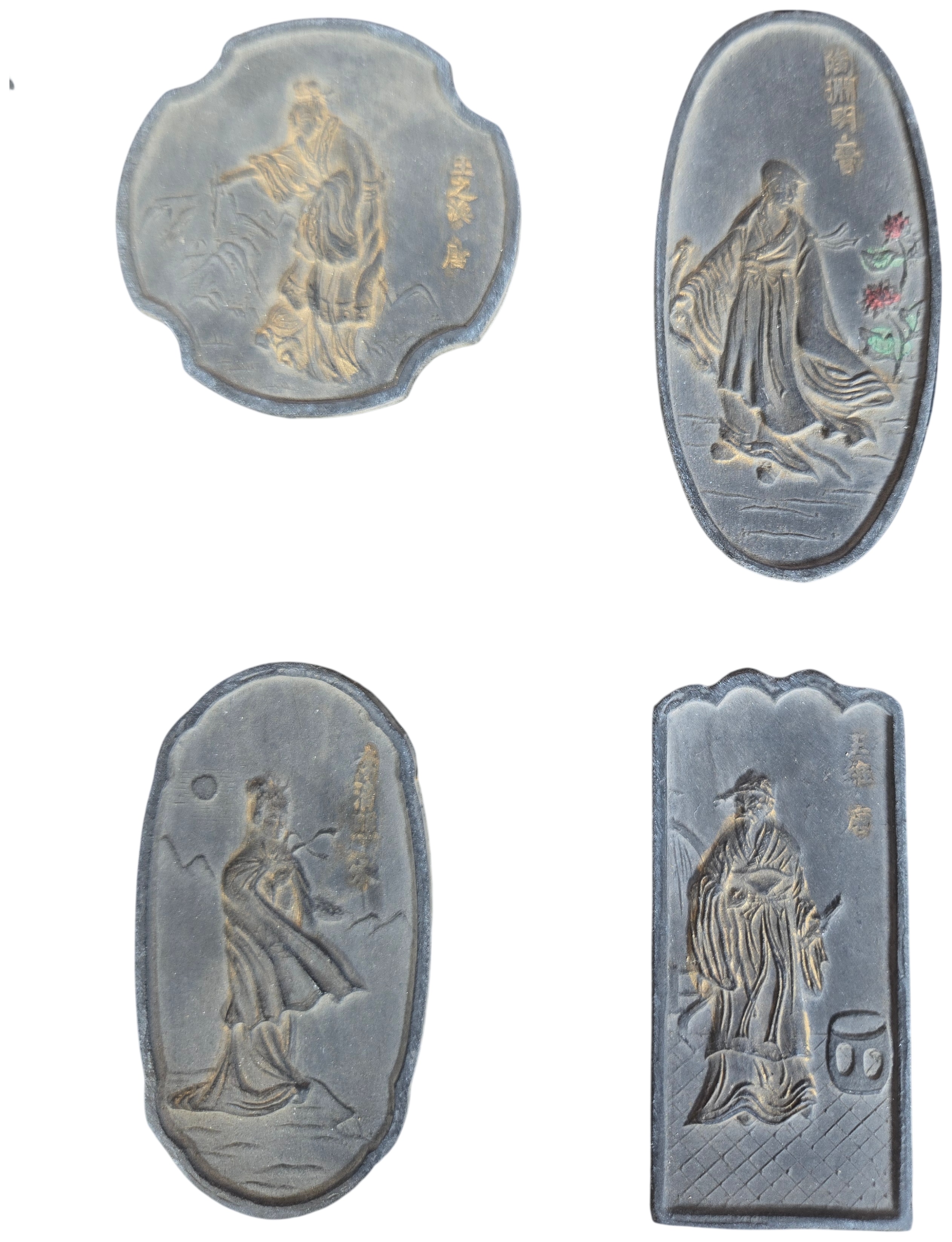 A Set of Nine Chinese Gilt and Polychrome Molded Inksticks