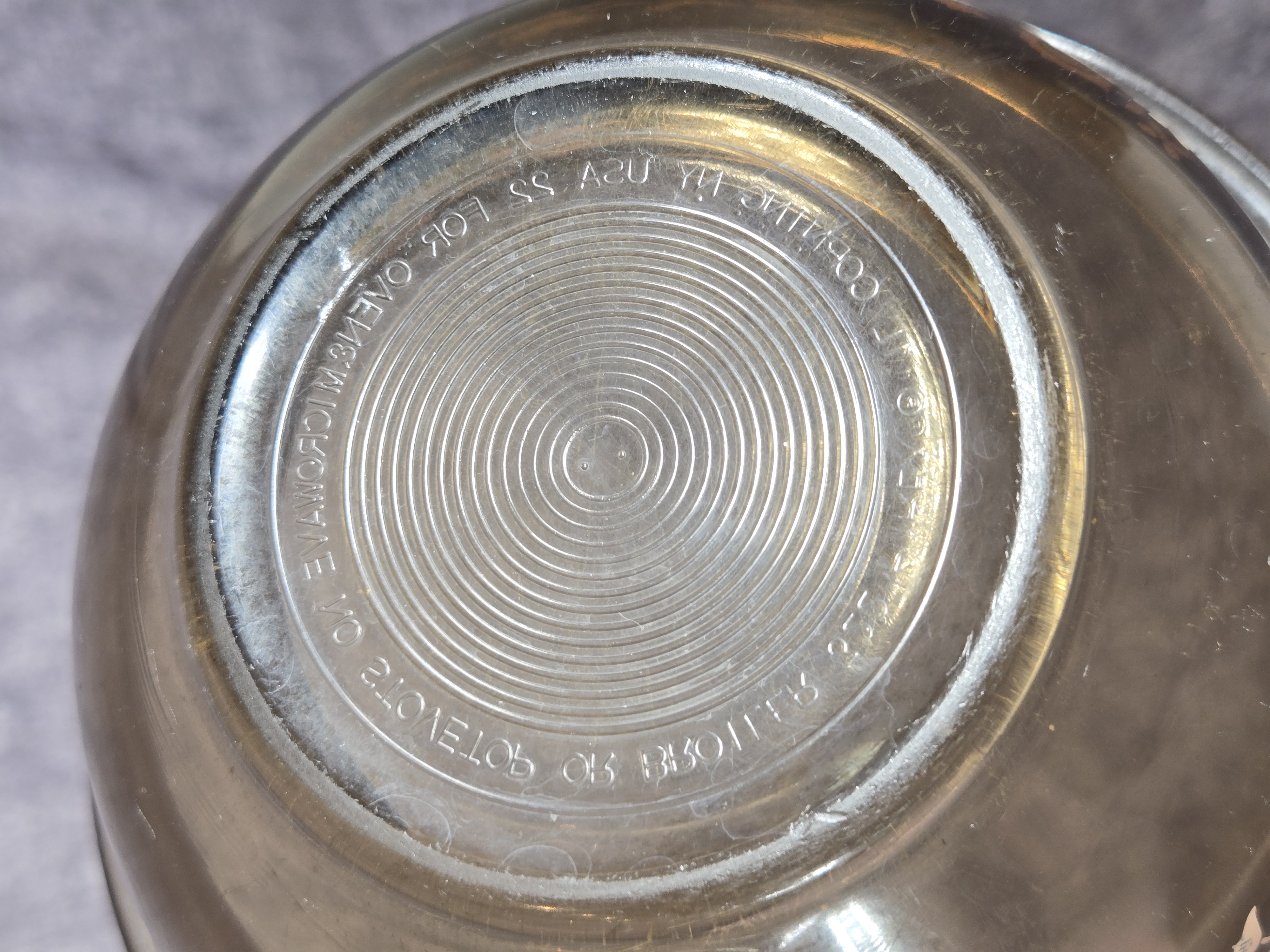 Two Vintage American Glass Mixing Bowls featuring Pyrex Butterprint and Corning Patterns