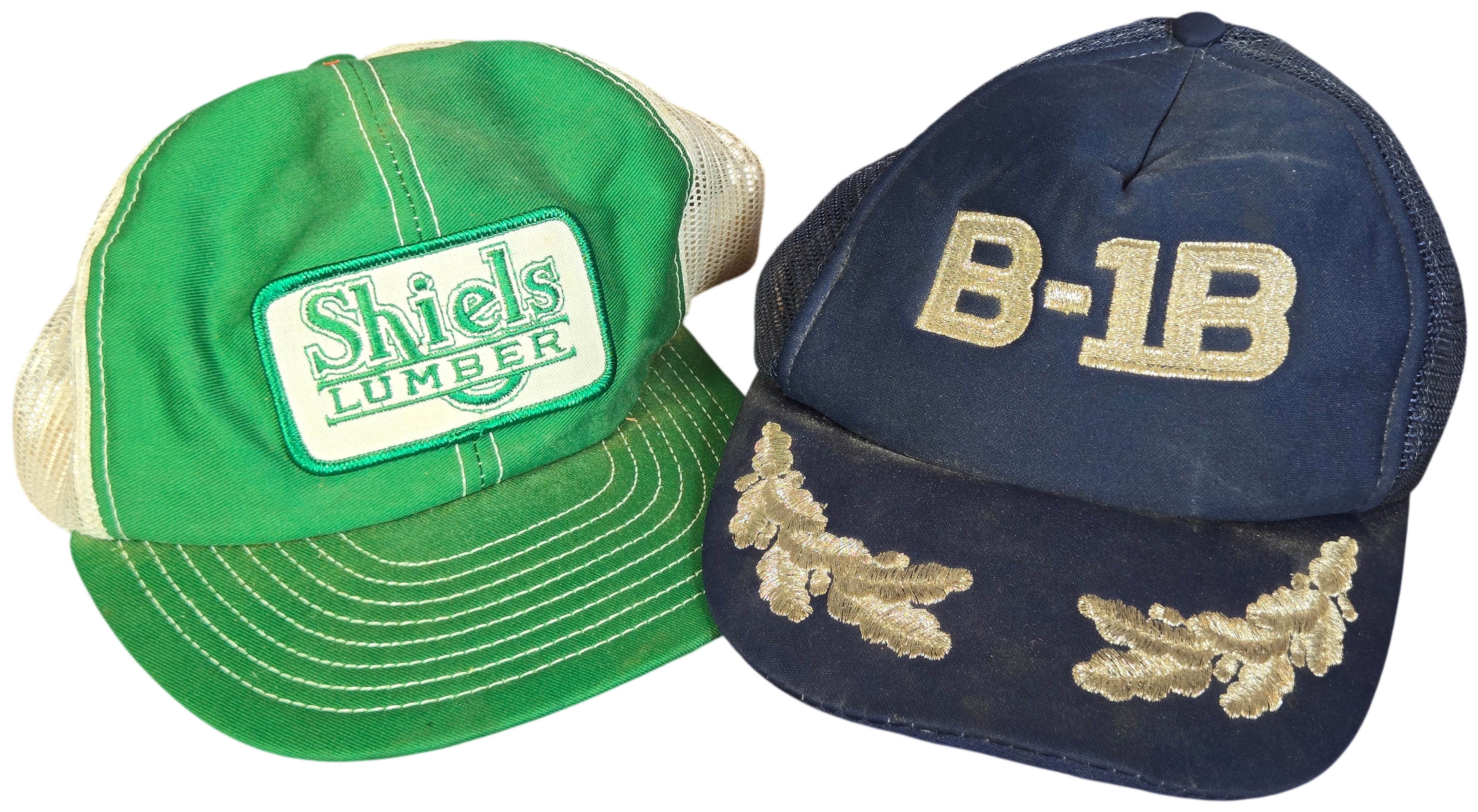 Two Vintage Mesh Trucker Snapback Baseball Caps featuring Shiels Lumber and B-1B Lancer