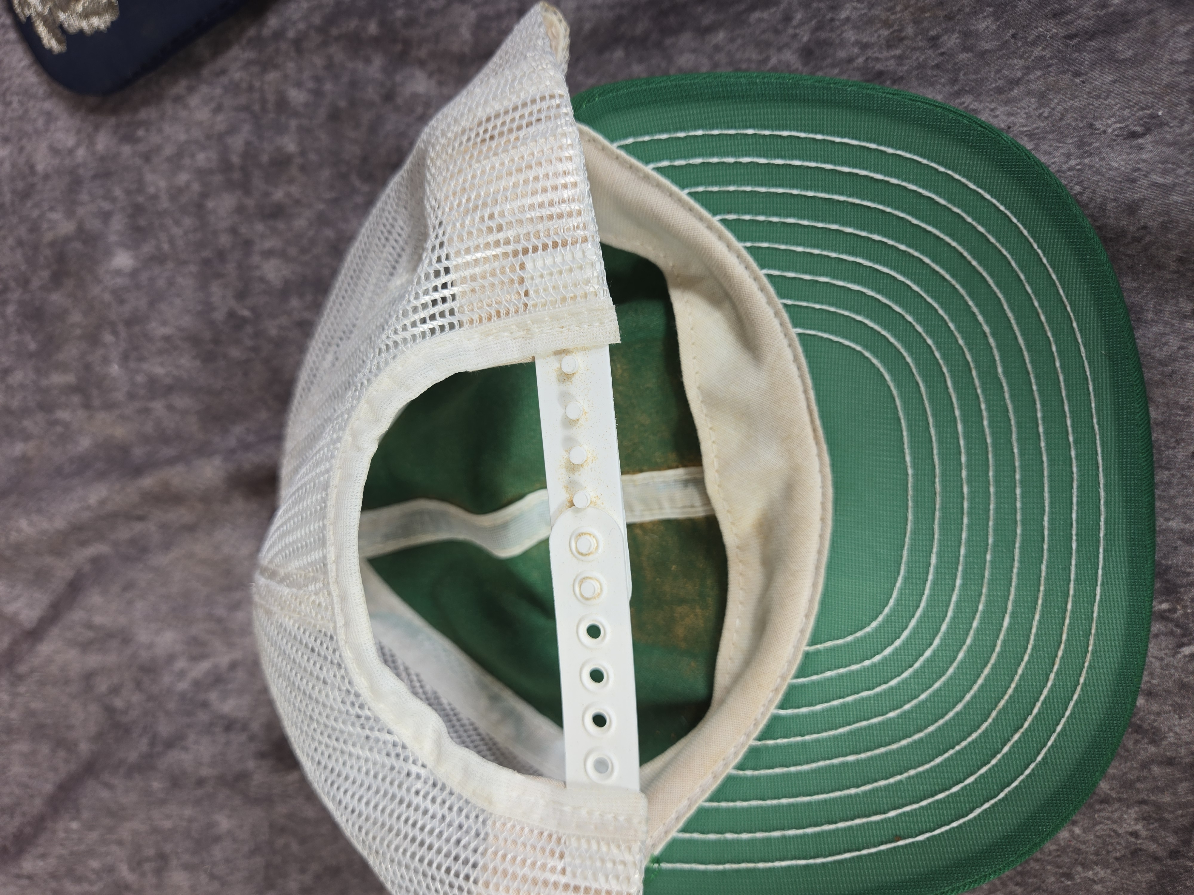 Two Vintage Mesh Trucker Snapback Baseball Caps featuring Shiels Lumber and B-1B Lancer