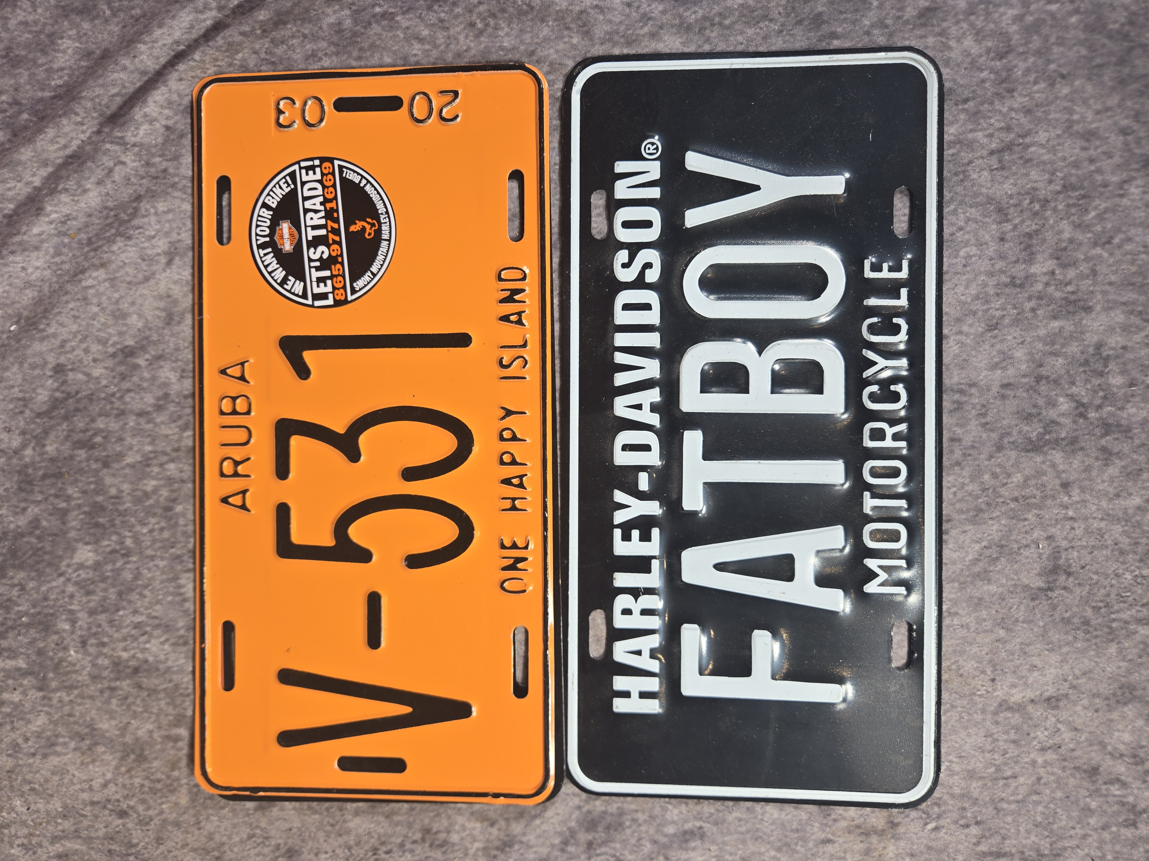 Seven Harley-Davidson and Motorcycle Themed Signs and License Plates
