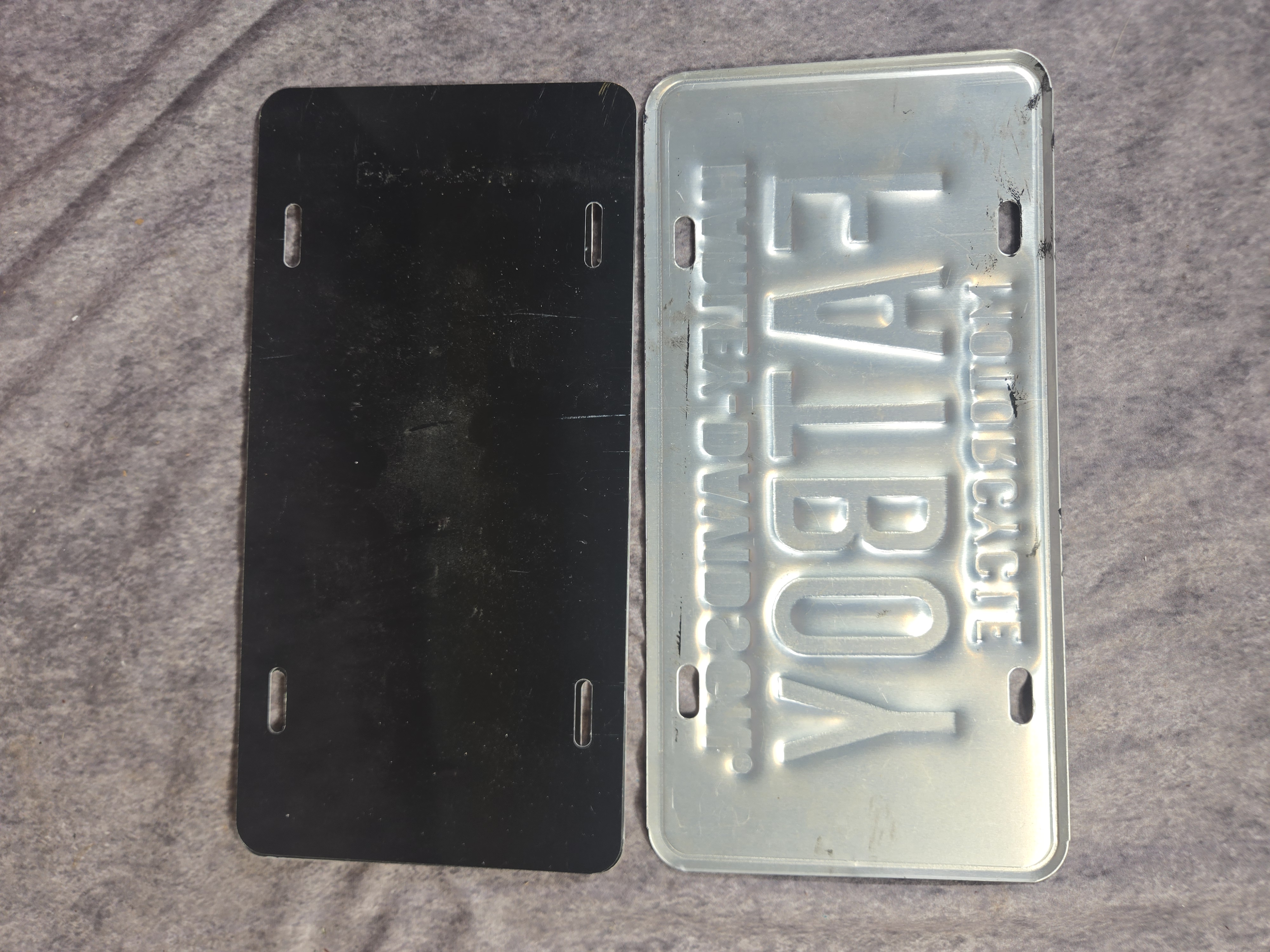 Seven Harley-Davidson and Motorcycle Themed Signs and License Plates