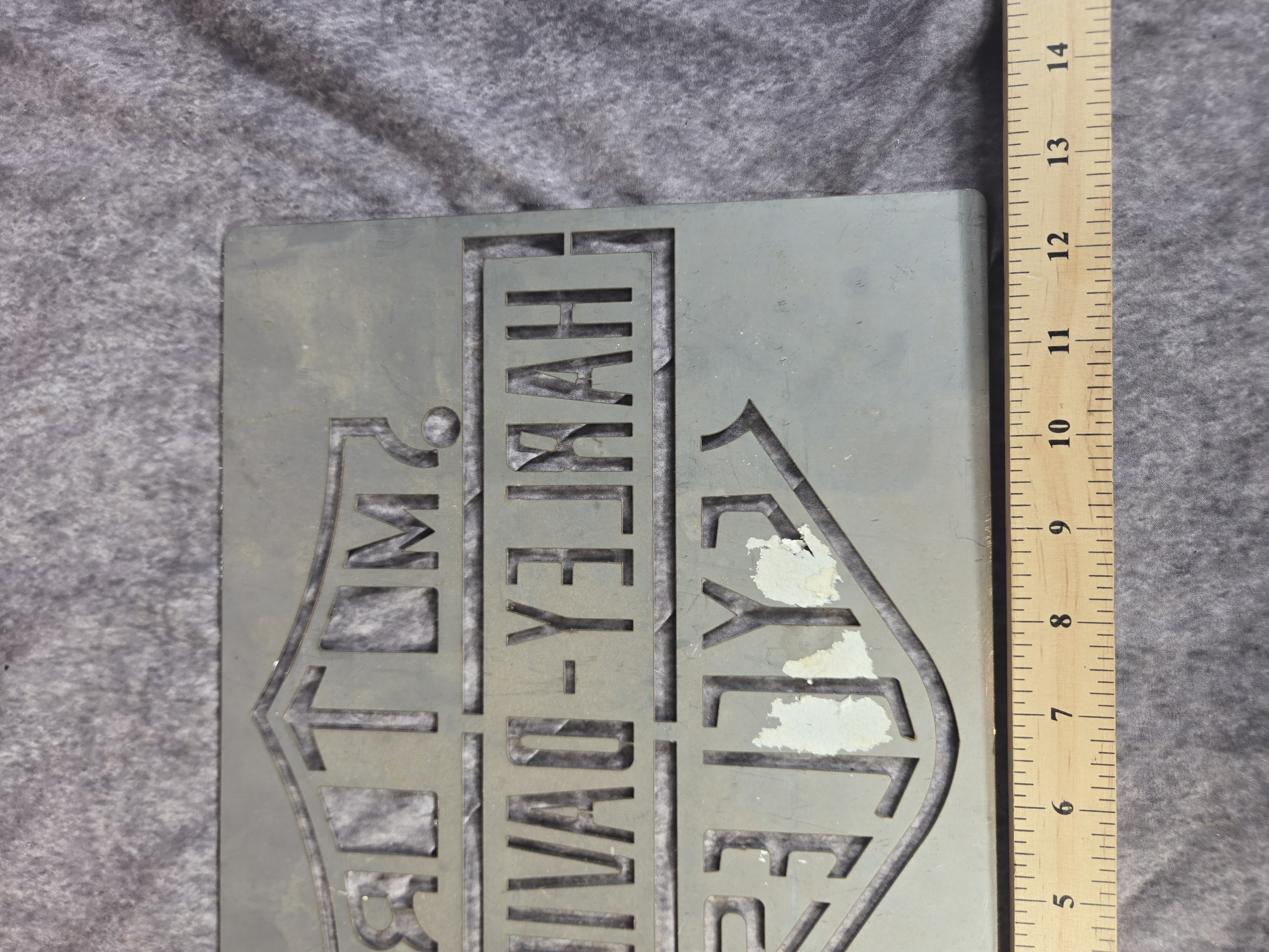 Four Harley-Davidson Branded Decorative Metal Signs and Bar and Shield Mirror