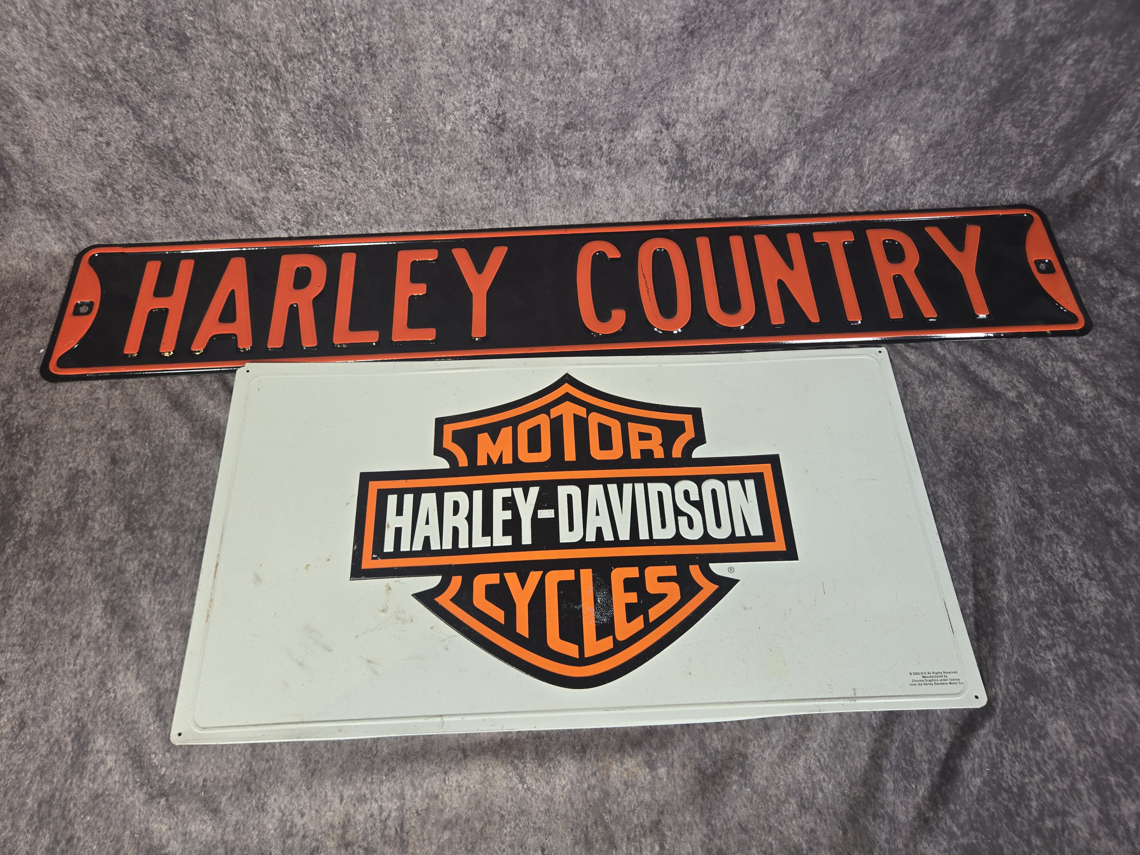 Four Harley-Davidson Branded Decorative Metal Signs and Bar and Shield Mirror