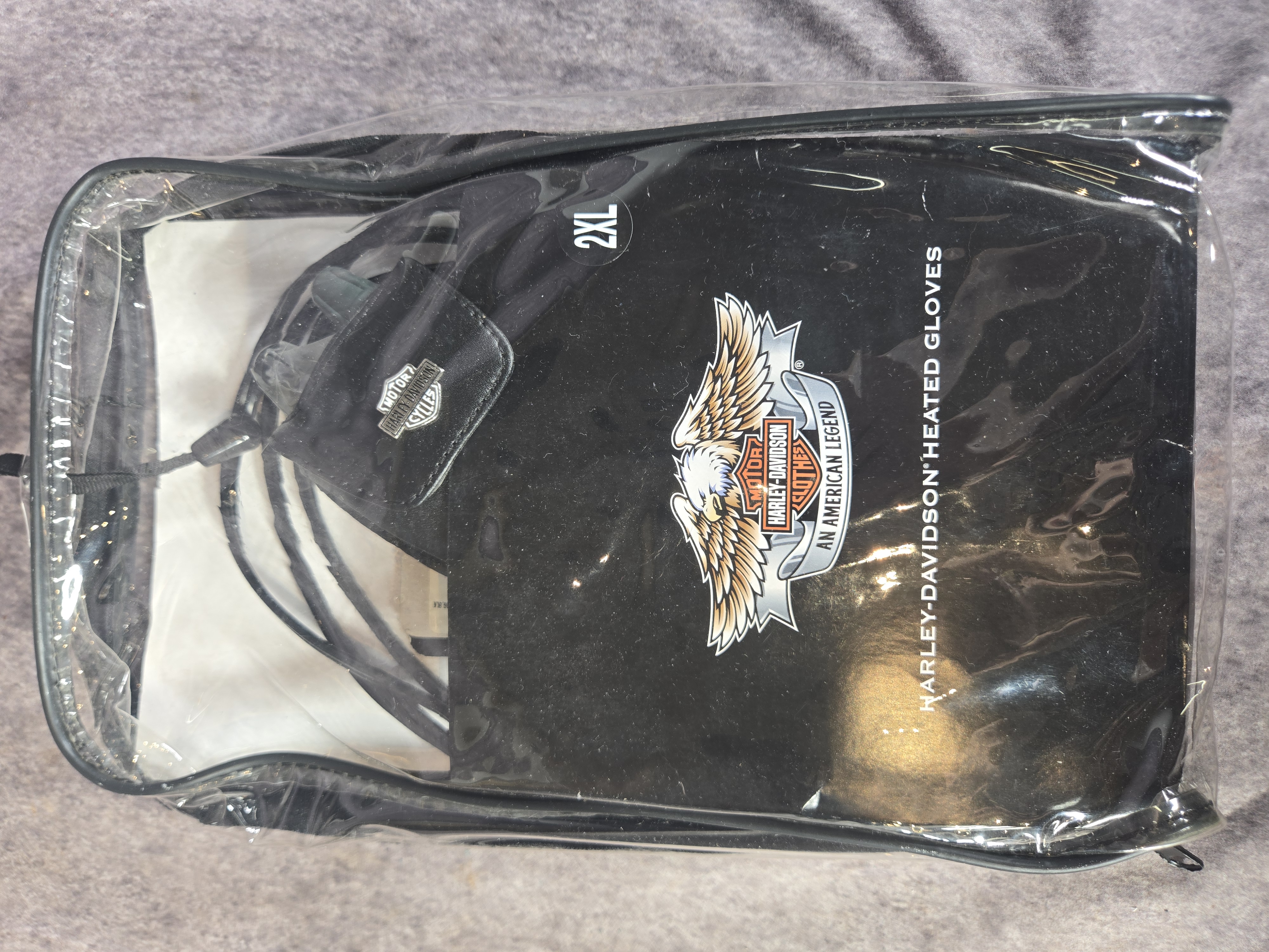 A Pair of Harley-Davidson Heated II Plug-In Motorcycle Gloves in Sizes XL and 2XL