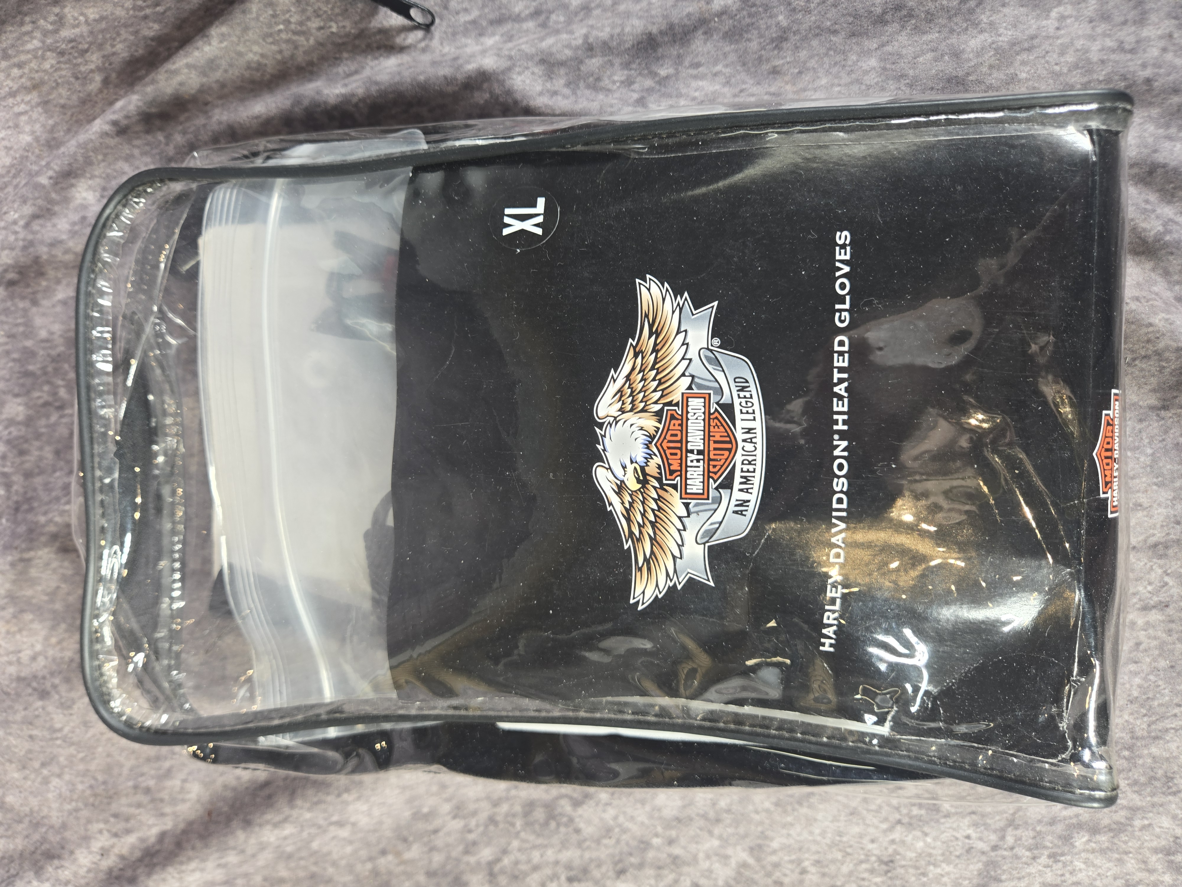 A Pair of Harley-Davidson Heated II Plug-In Motorcycle Gloves in Sizes XL and 2XL