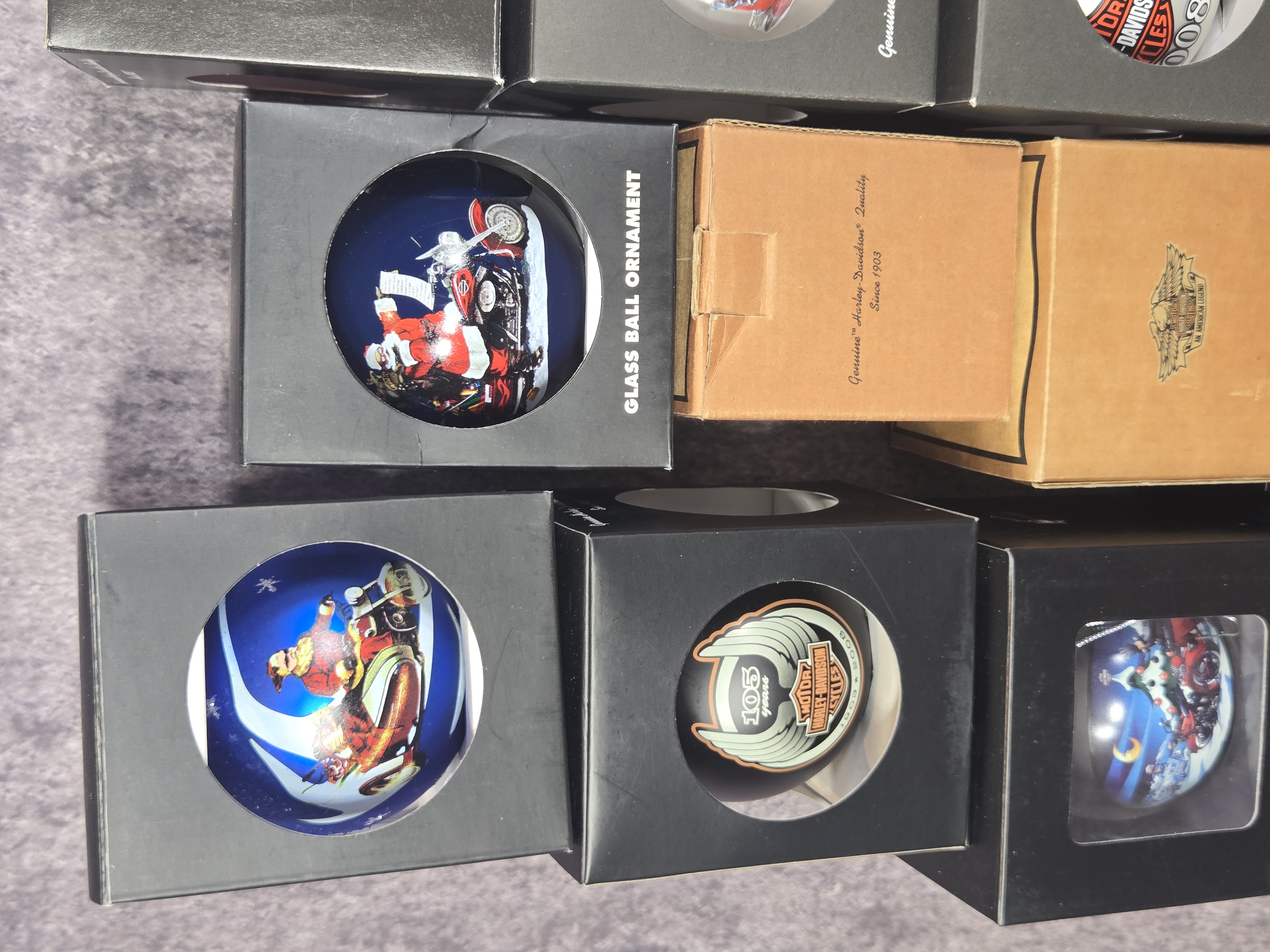 Sixteen Harley-Davidson Holiday Ornaments and Collectibles Dated 2001 to 2014