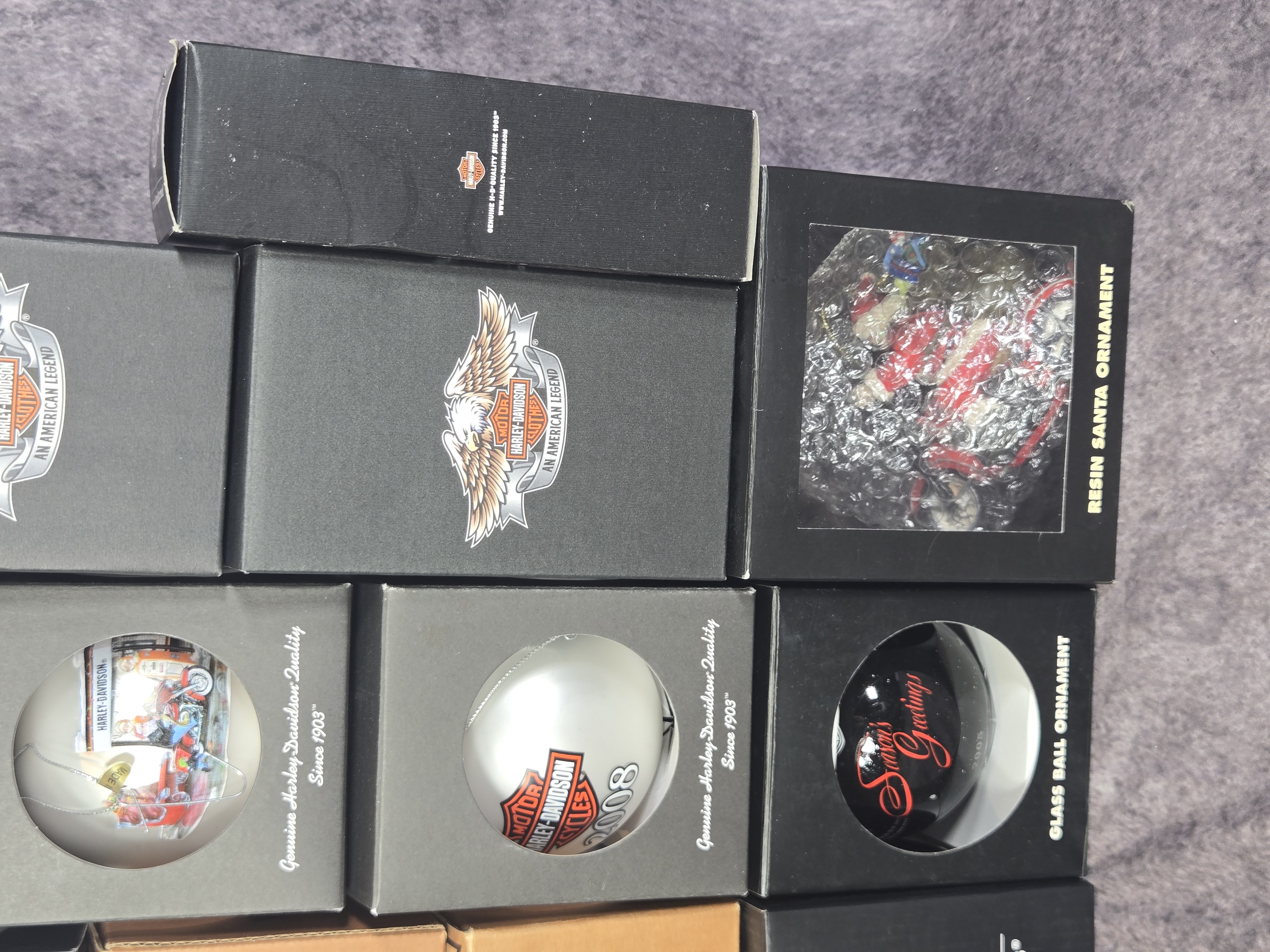 Sixteen Harley-Davidson Holiday Ornaments and Collectibles Dated 2001 to 2014