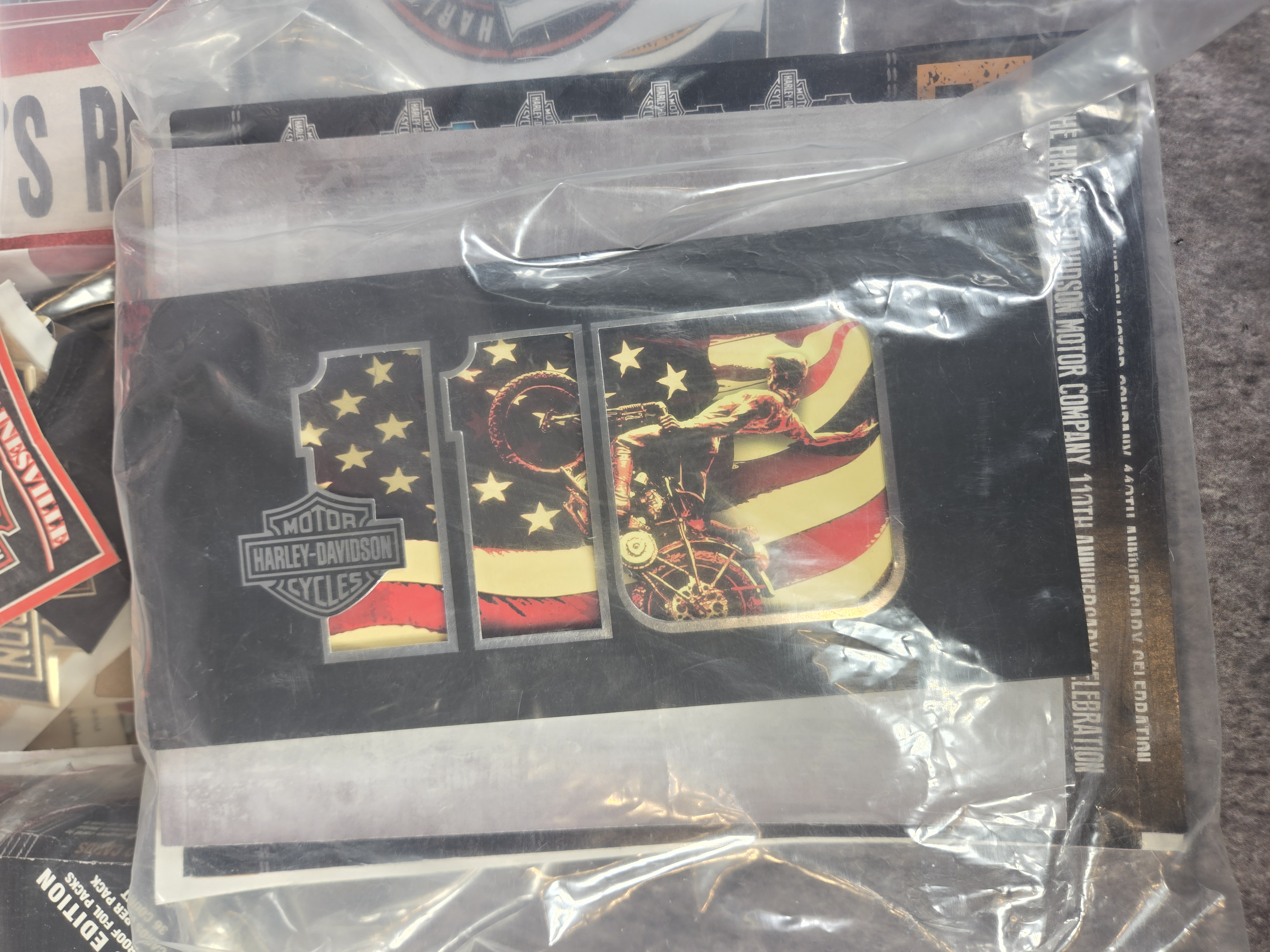 Harley-Davidson Collectibles featuring Unopened Collector Cards, Banner, and Dealership Decals