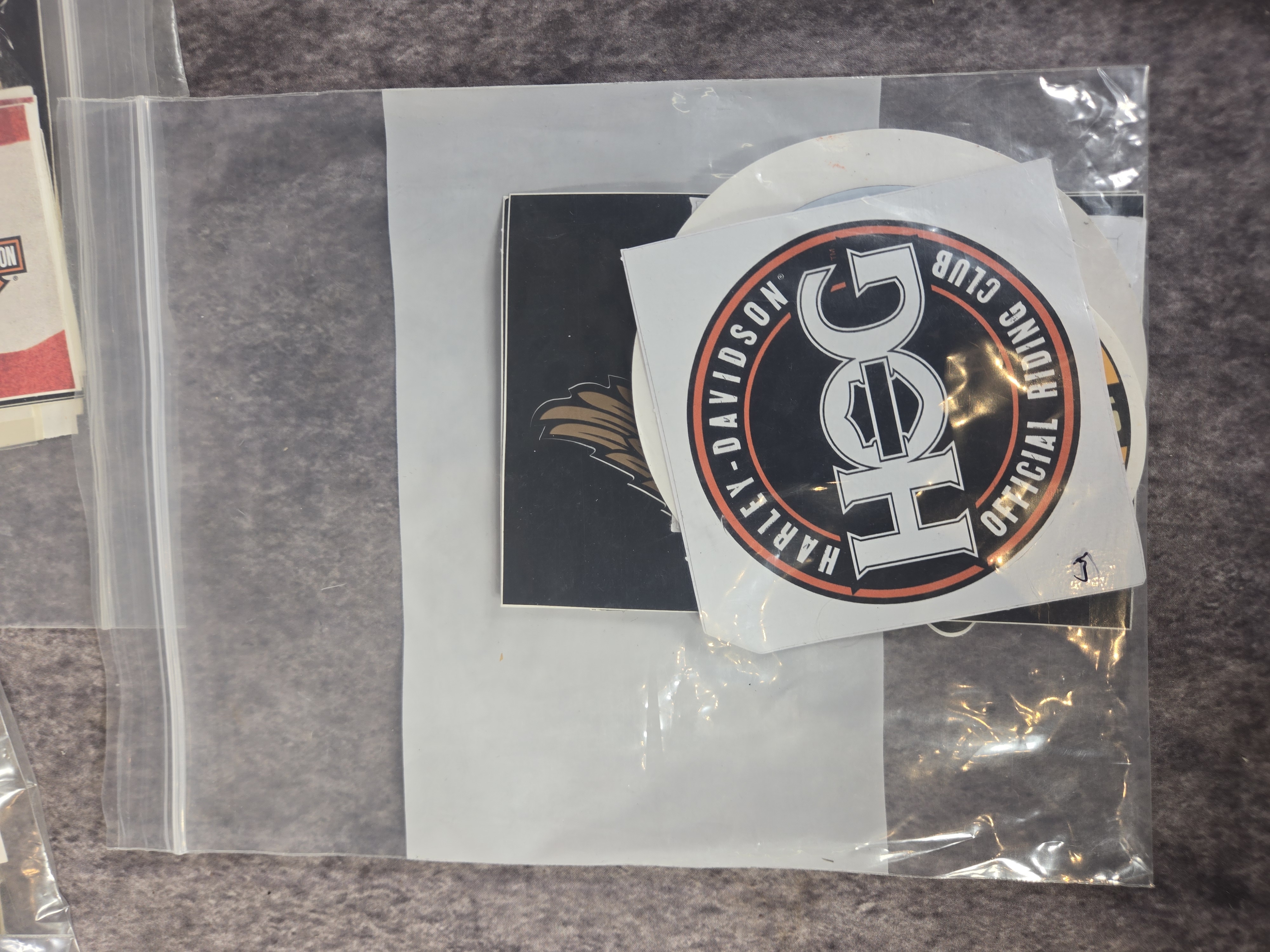 Harley-Davidson Collectibles featuring Unopened Collector Cards, Banner, and Dealership Decals