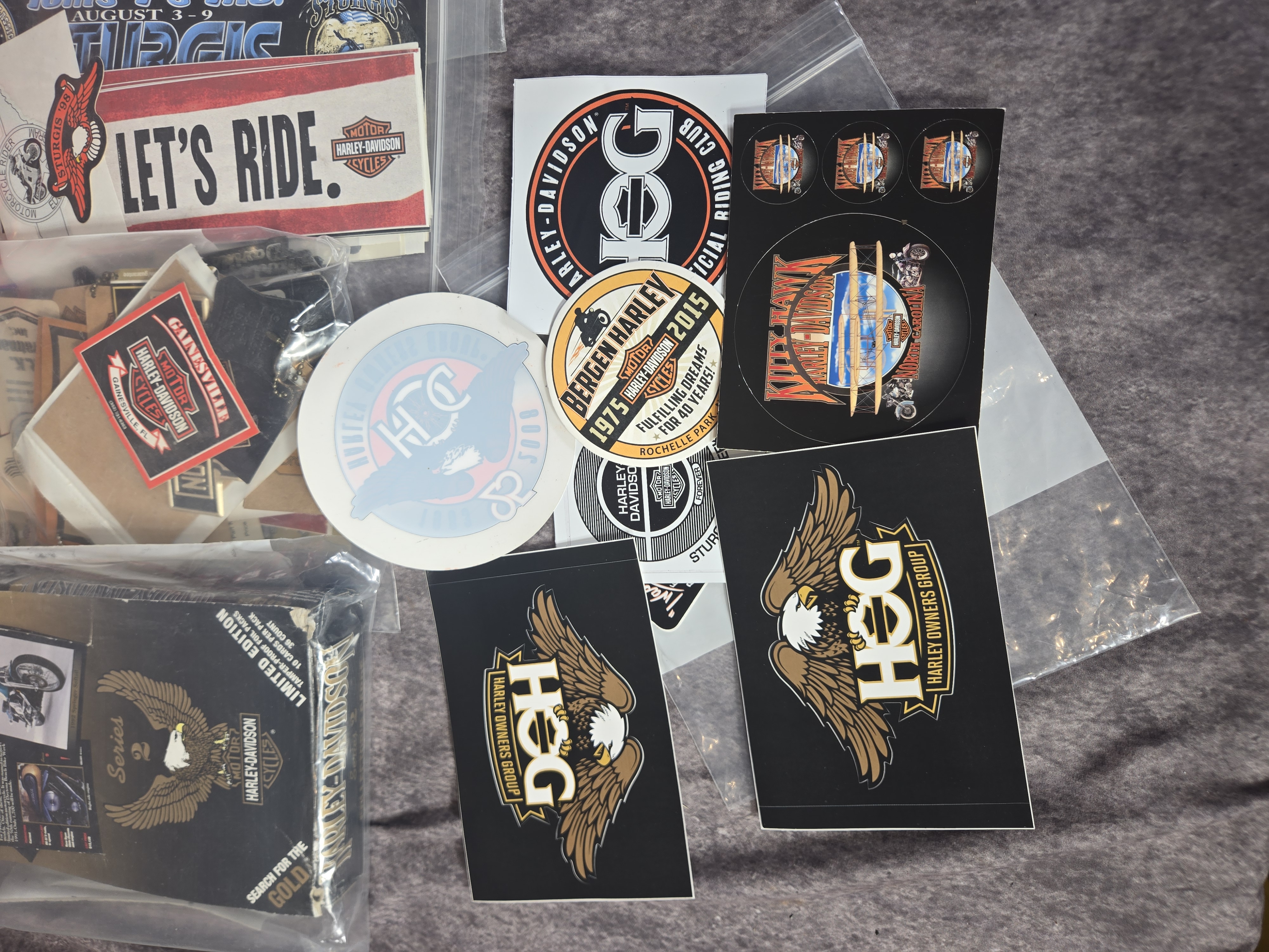 Harley-Davidson Collectibles featuring Unopened Collector Cards, Banner, and Dealership Decals