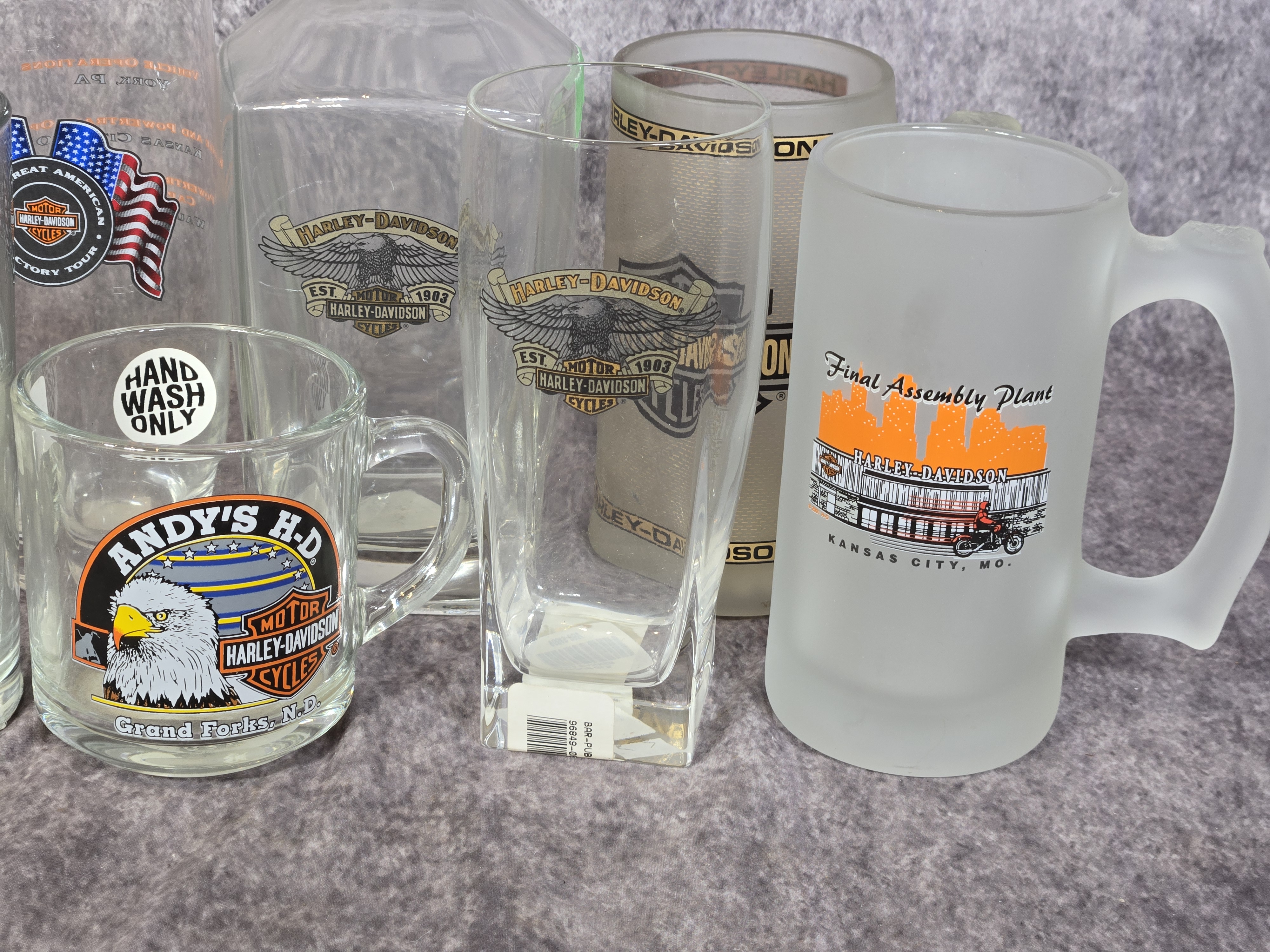 Twelve Harley-Davidson Commemorative and Dealership Barware Items