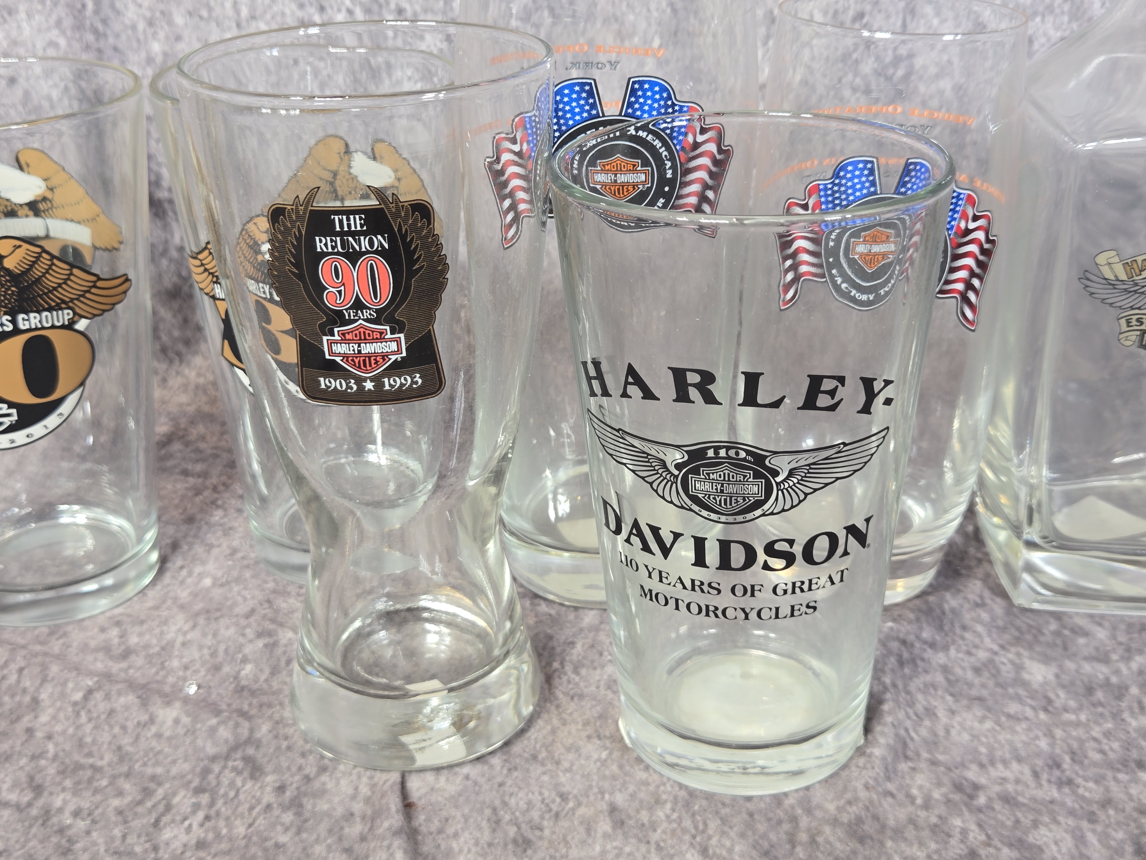 Twelve Harley-Davidson Commemorative and Dealership Barware Items