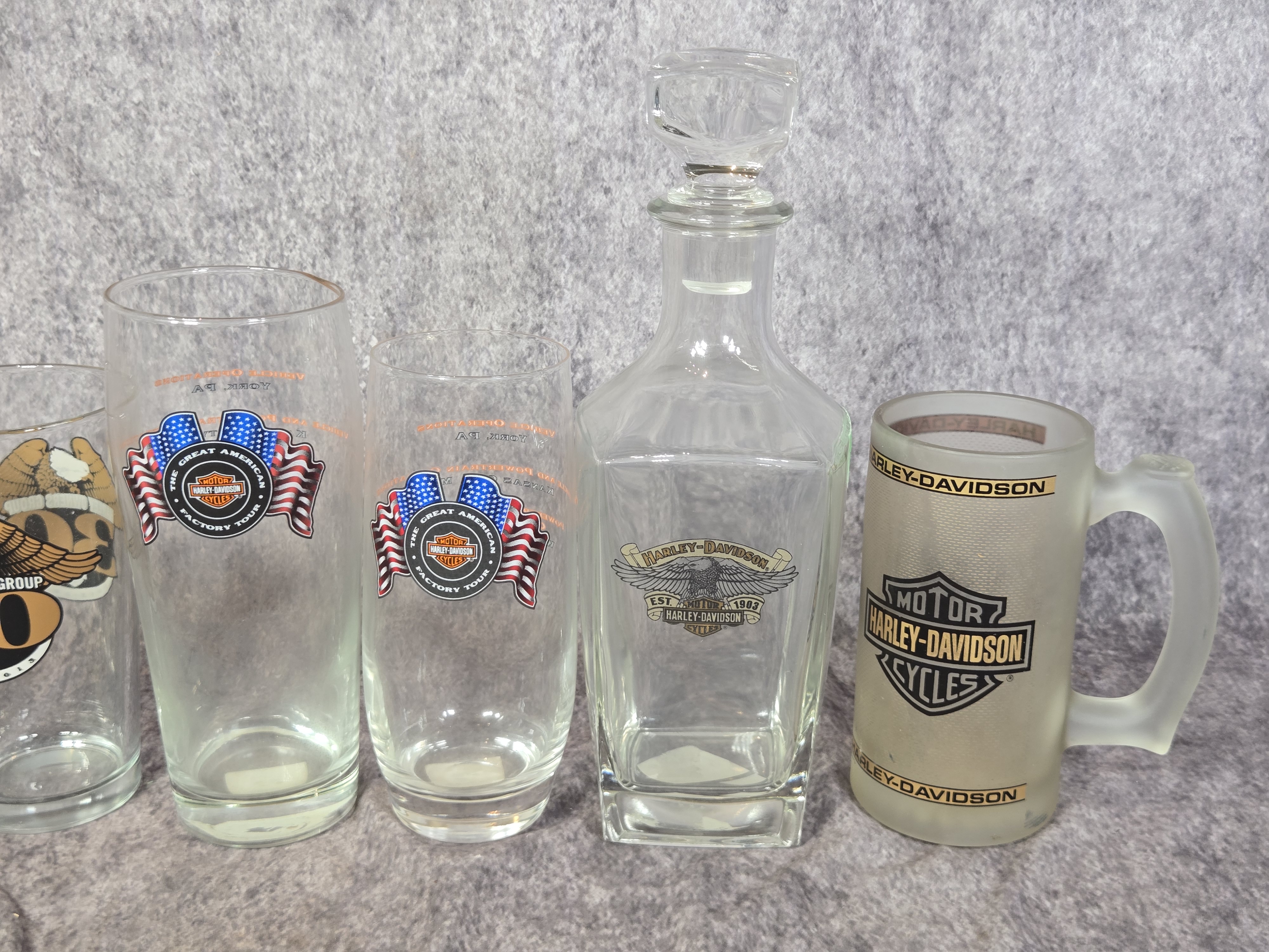 Twelve Harley-Davidson Commemorative and Dealership Barware Items