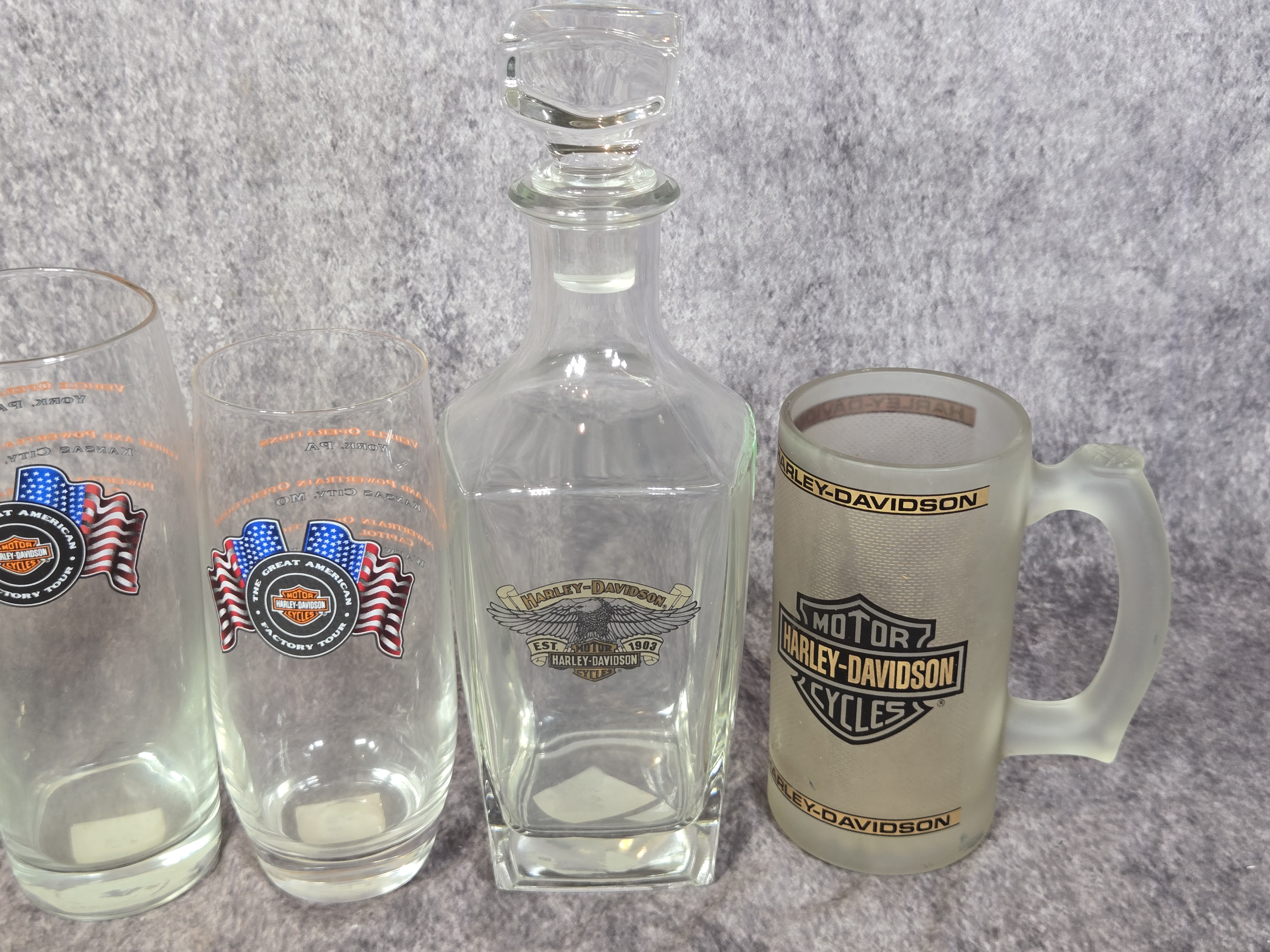 Twelve Harley-Davidson Commemorative and Dealership Barware Items