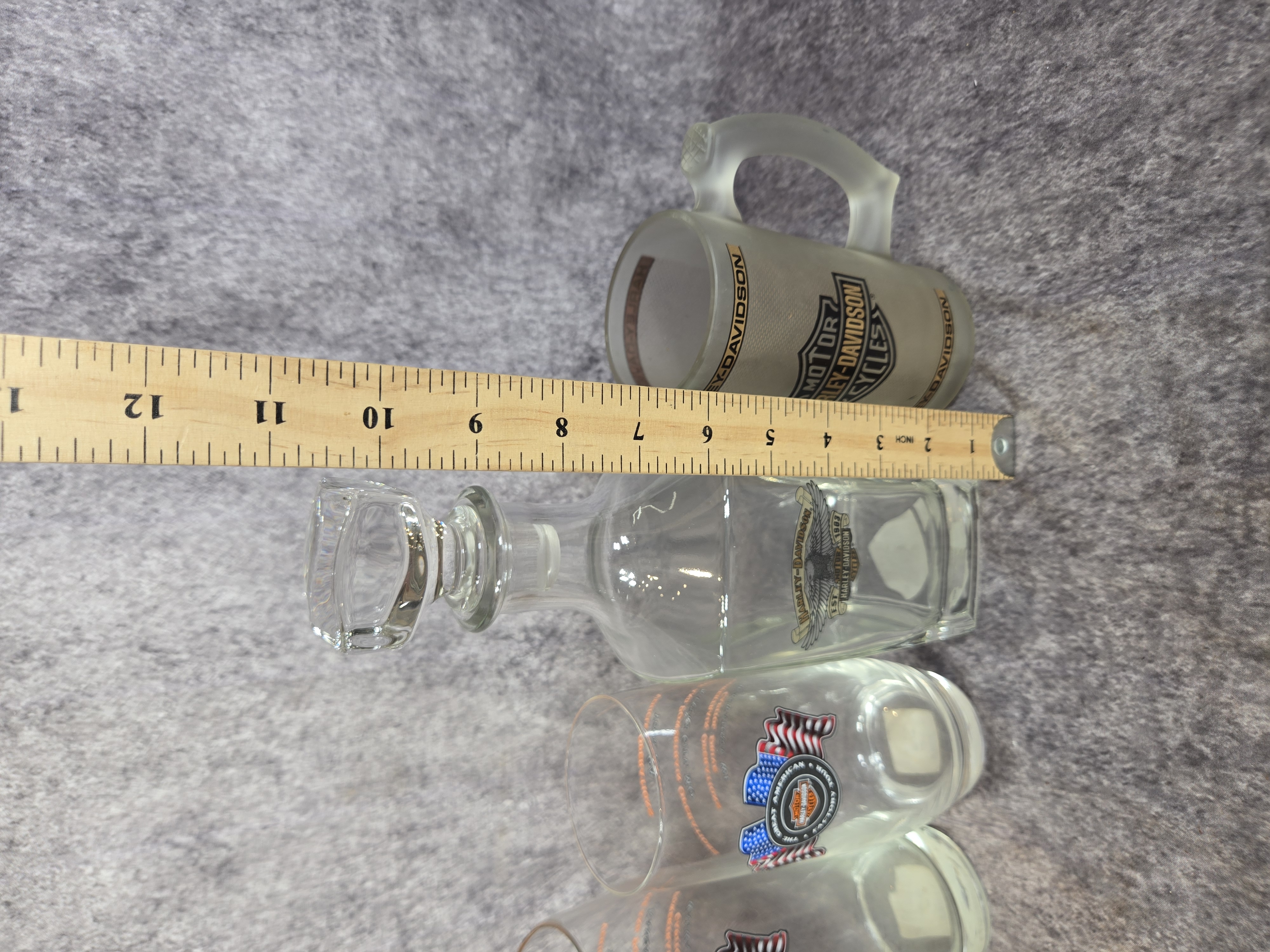 Twelve Harley-Davidson Commemorative and Dealership Barware Items