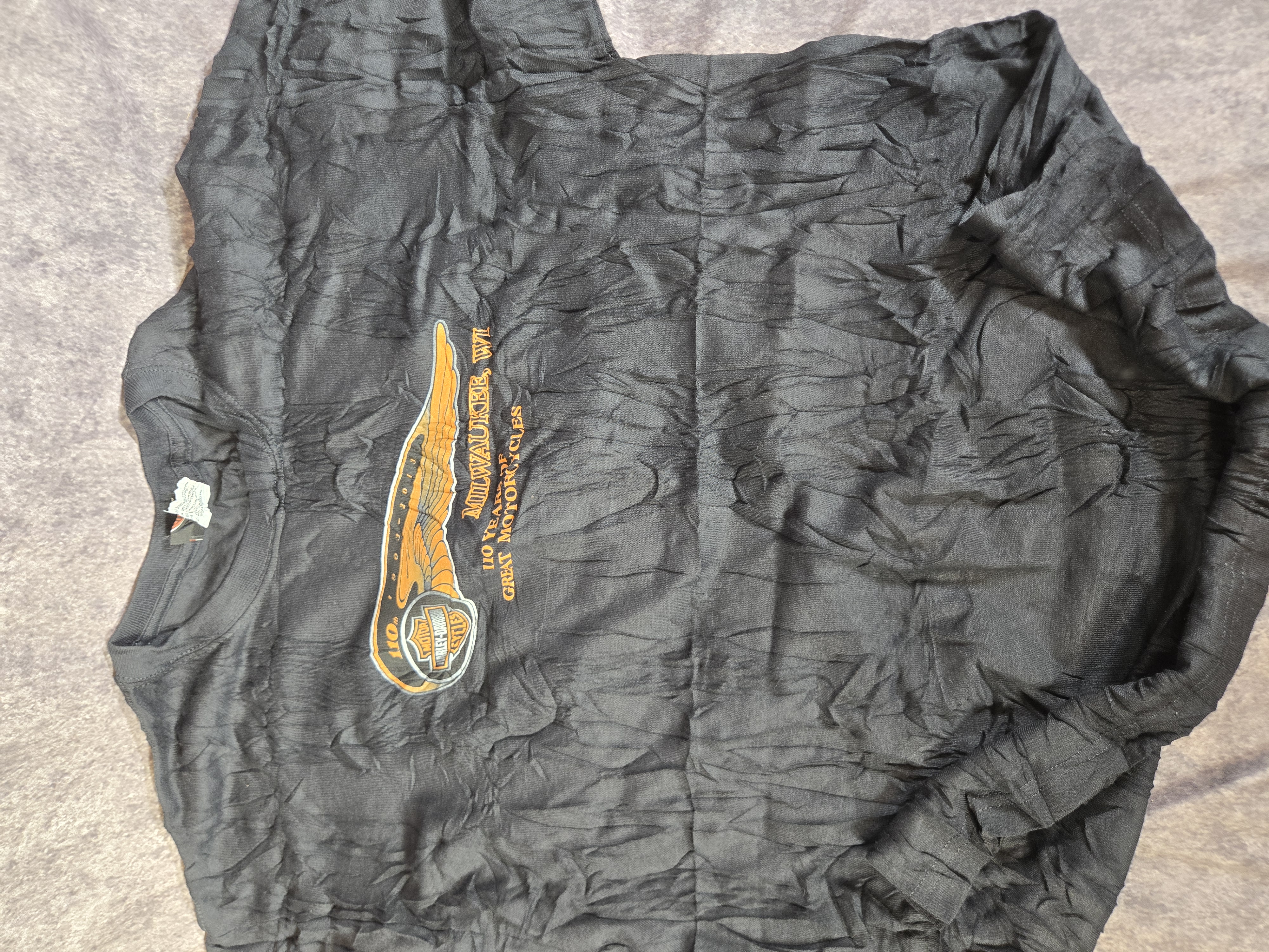 Two Harley-Davidson T-Shirts with 110th Anniversary and What Jingles Your Bells Graphics