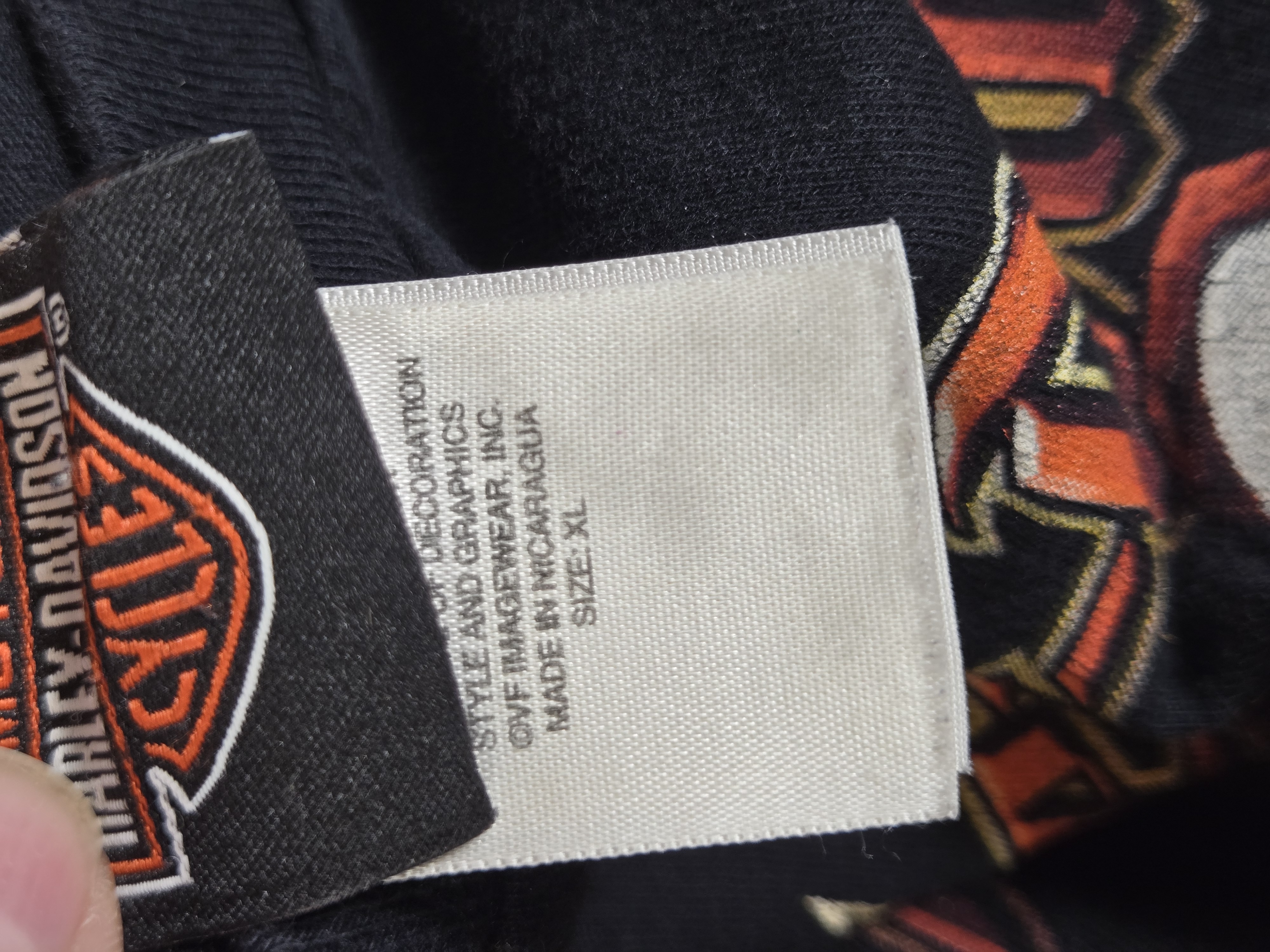 Two Harley-Davidson T-Shirts with 110th Anniversary and What Jingles Your Bells Graphics