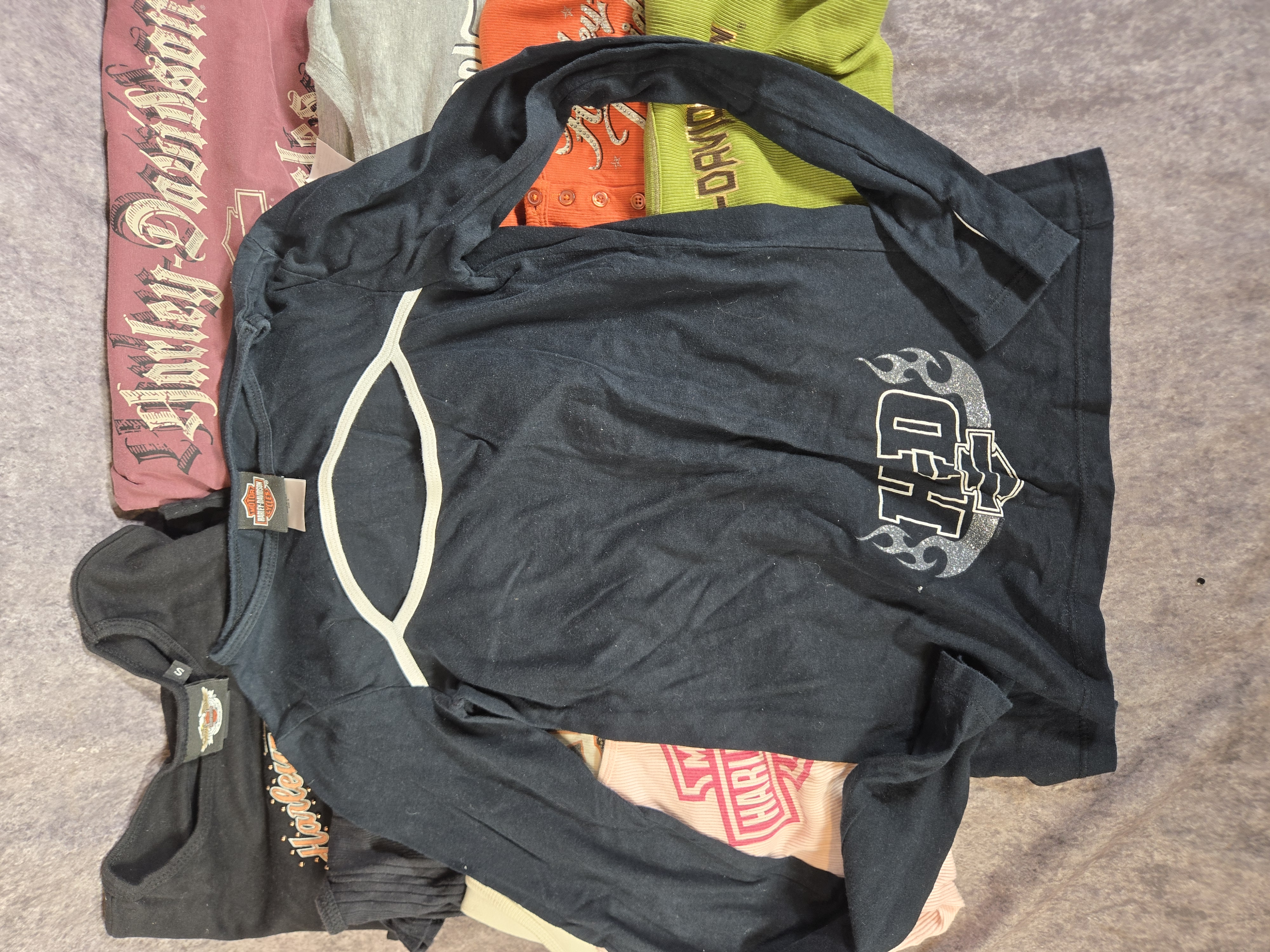 Eleven Women's Harley-Davidson Motorclothes Apparel Pieces featuring Dealer and Anniversary Graphics