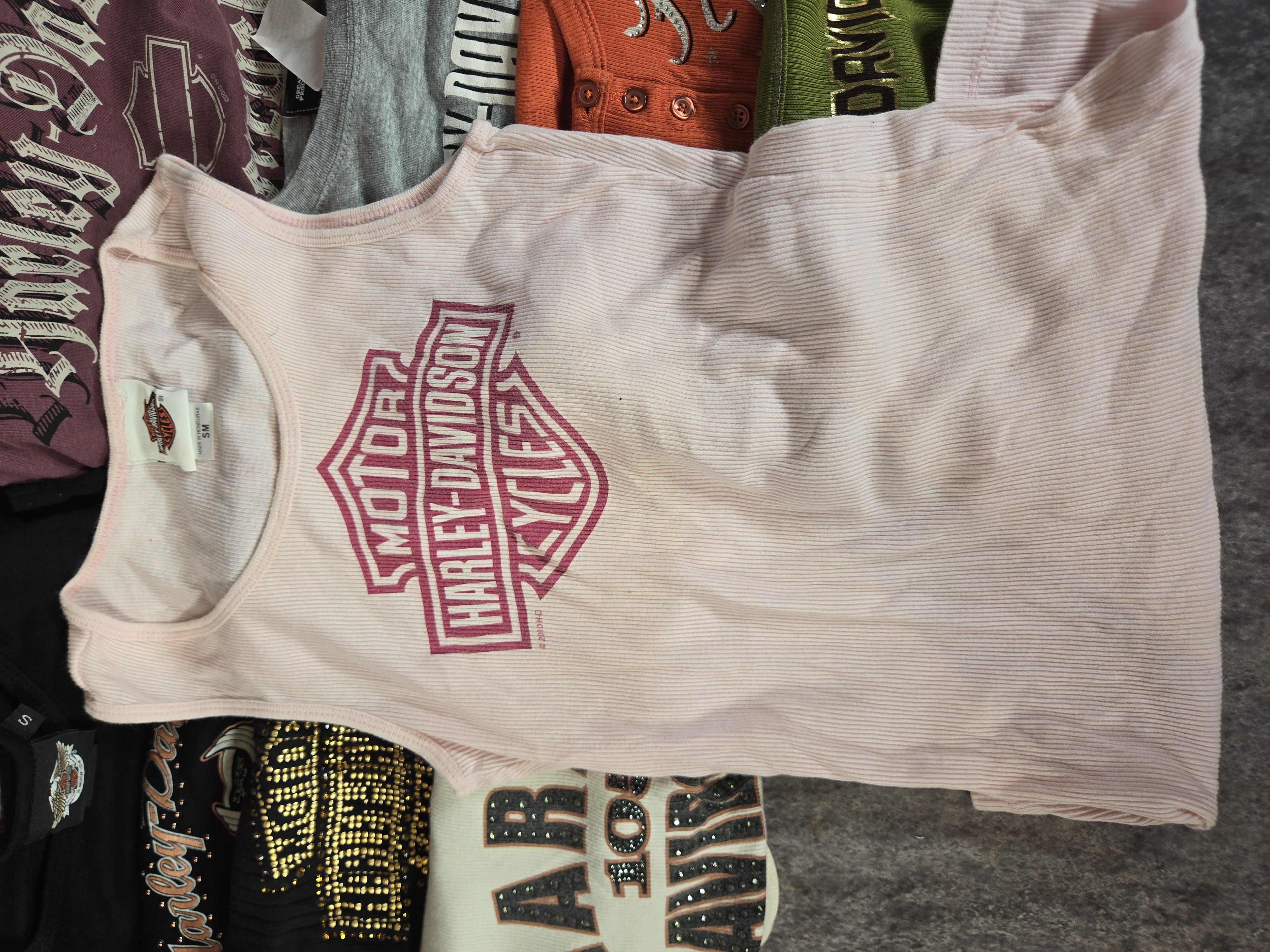 Eleven Women's Harley-Davidson Motorclothes Apparel Pieces featuring Dealer and Anniversary Graphics