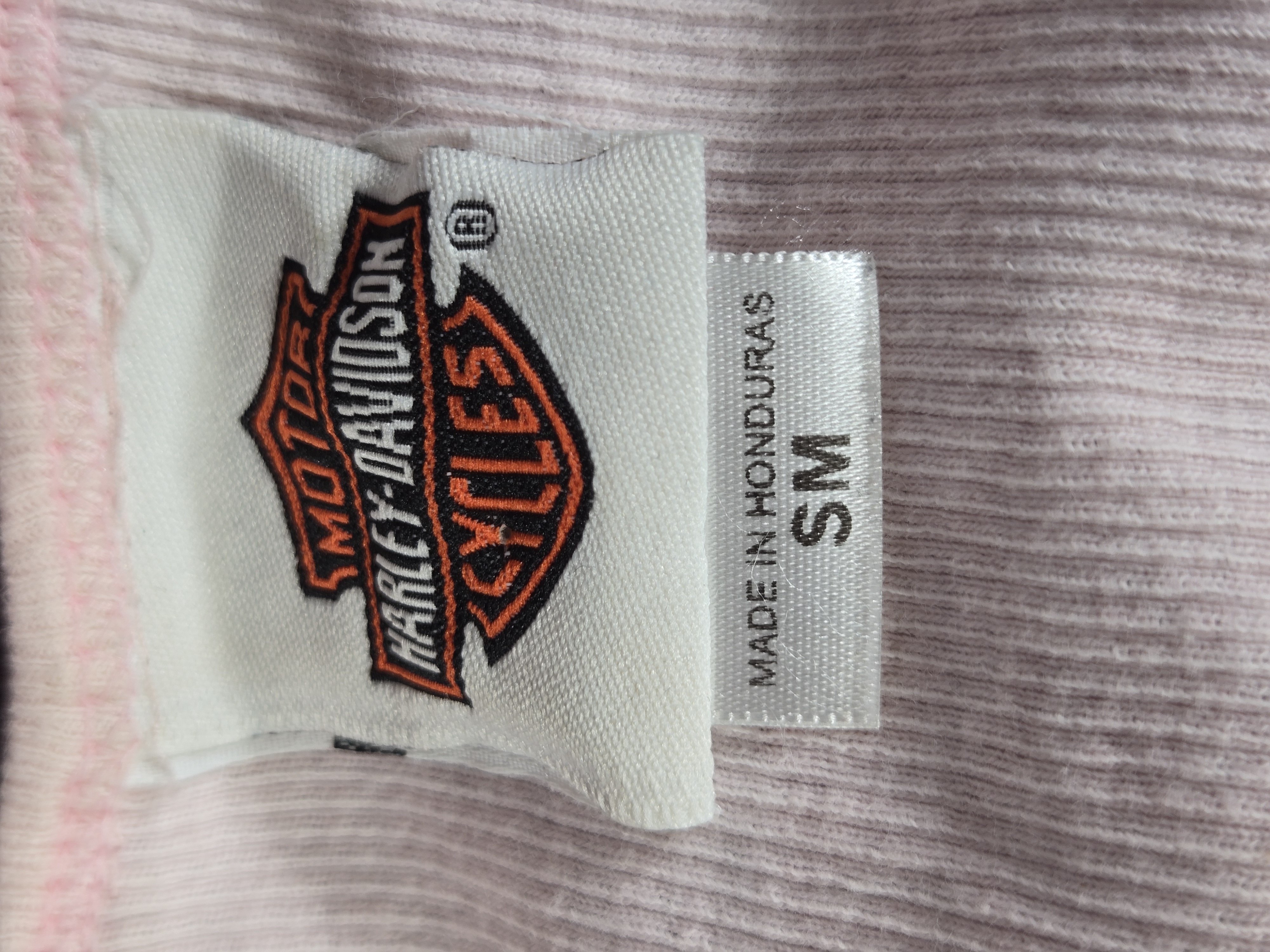 Eleven Women's Harley-Davidson Motorclothes Apparel Pieces featuring Dealer and Anniversary Graphics