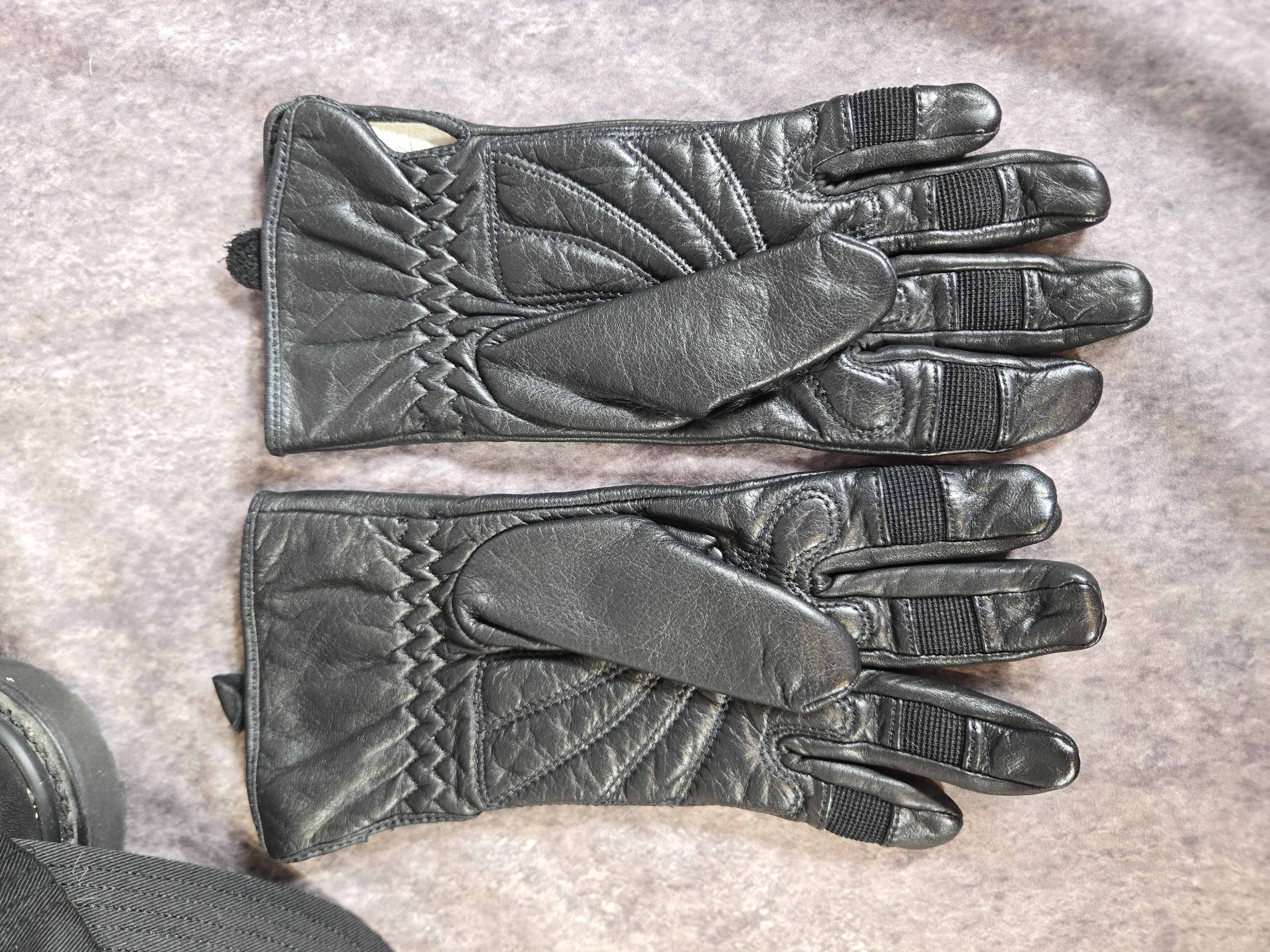 A Group of Harley-Davidson Branded Leather Boots and Apparel