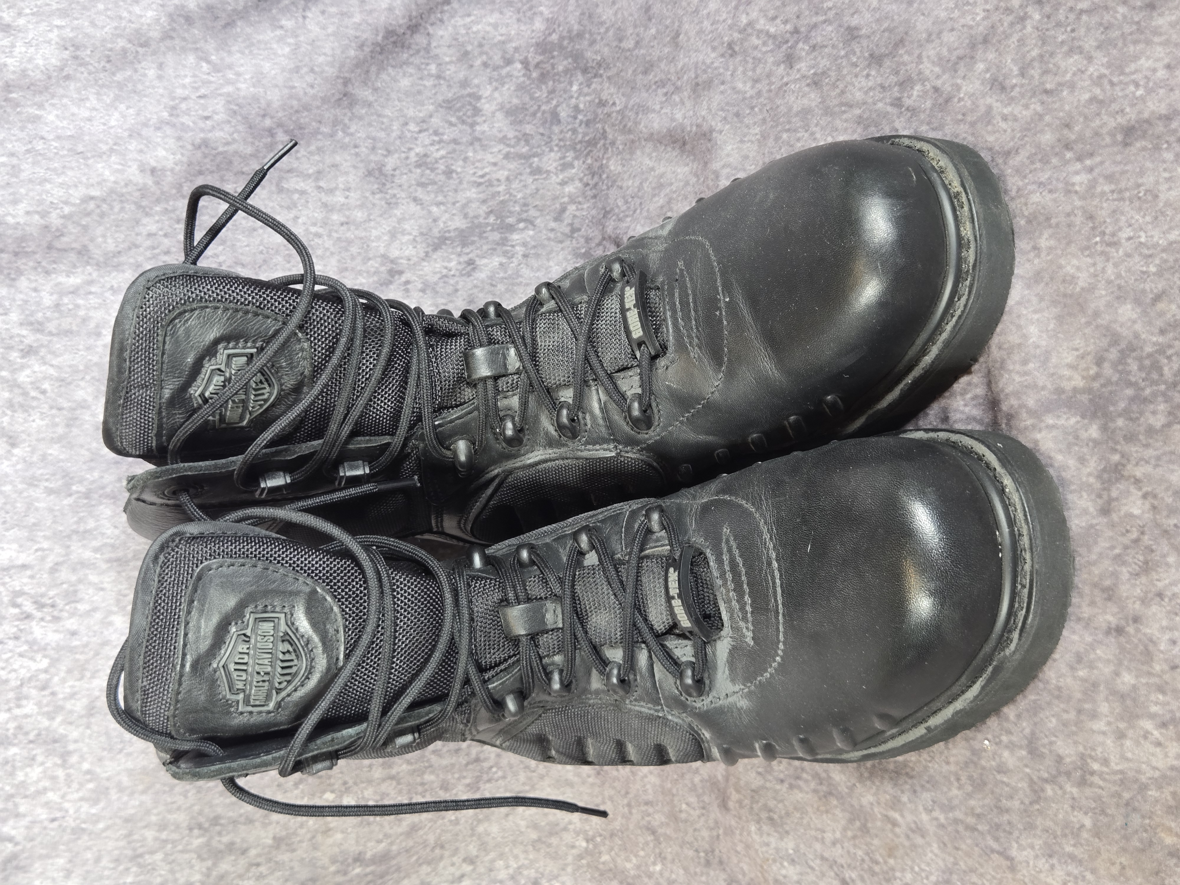 A Group of Harley-Davidson Branded Leather Boots and Apparel