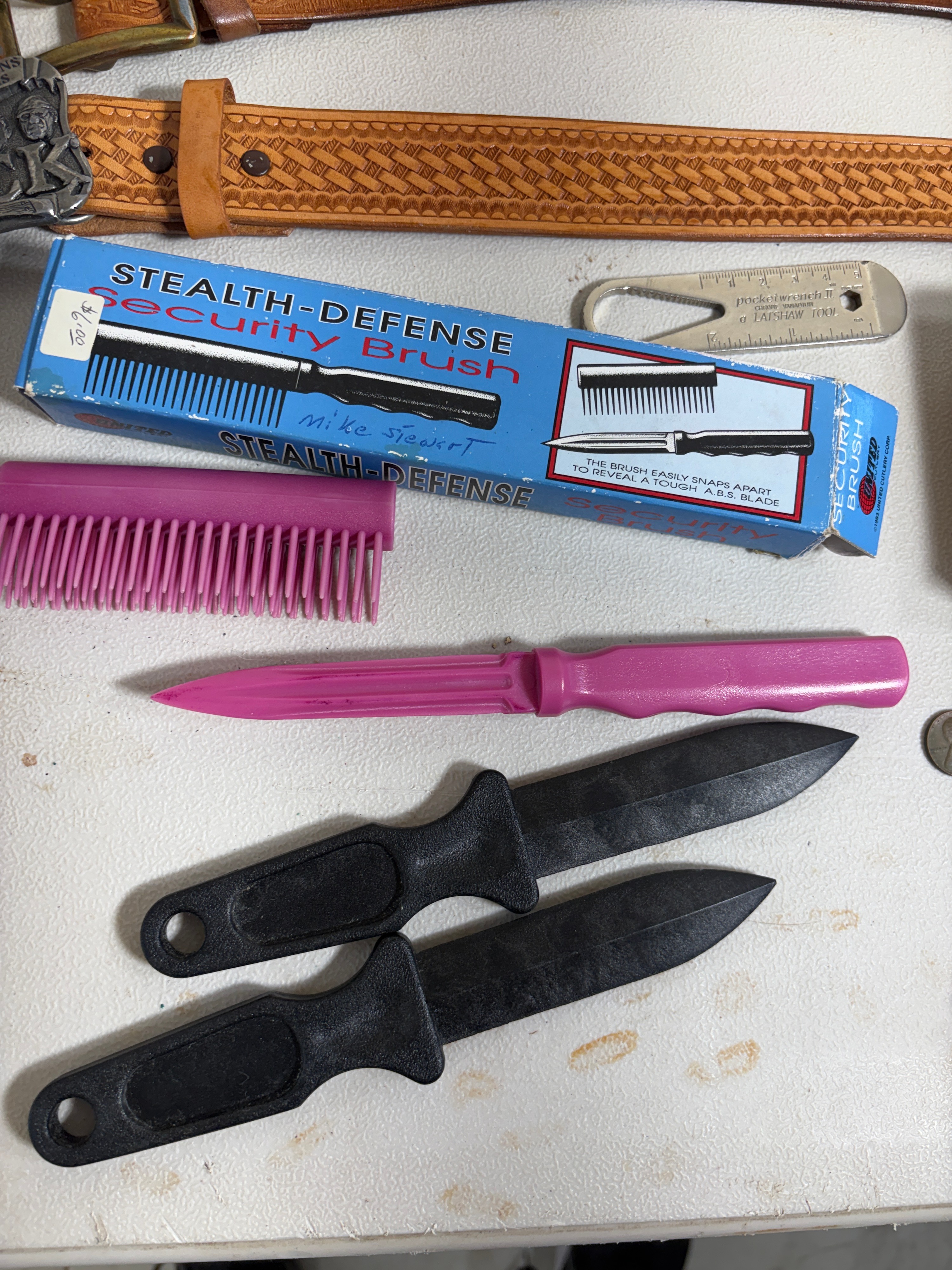 Assorted Hunting and Folding Knives with Tooled Leather Belts and Collectible Case Packaging