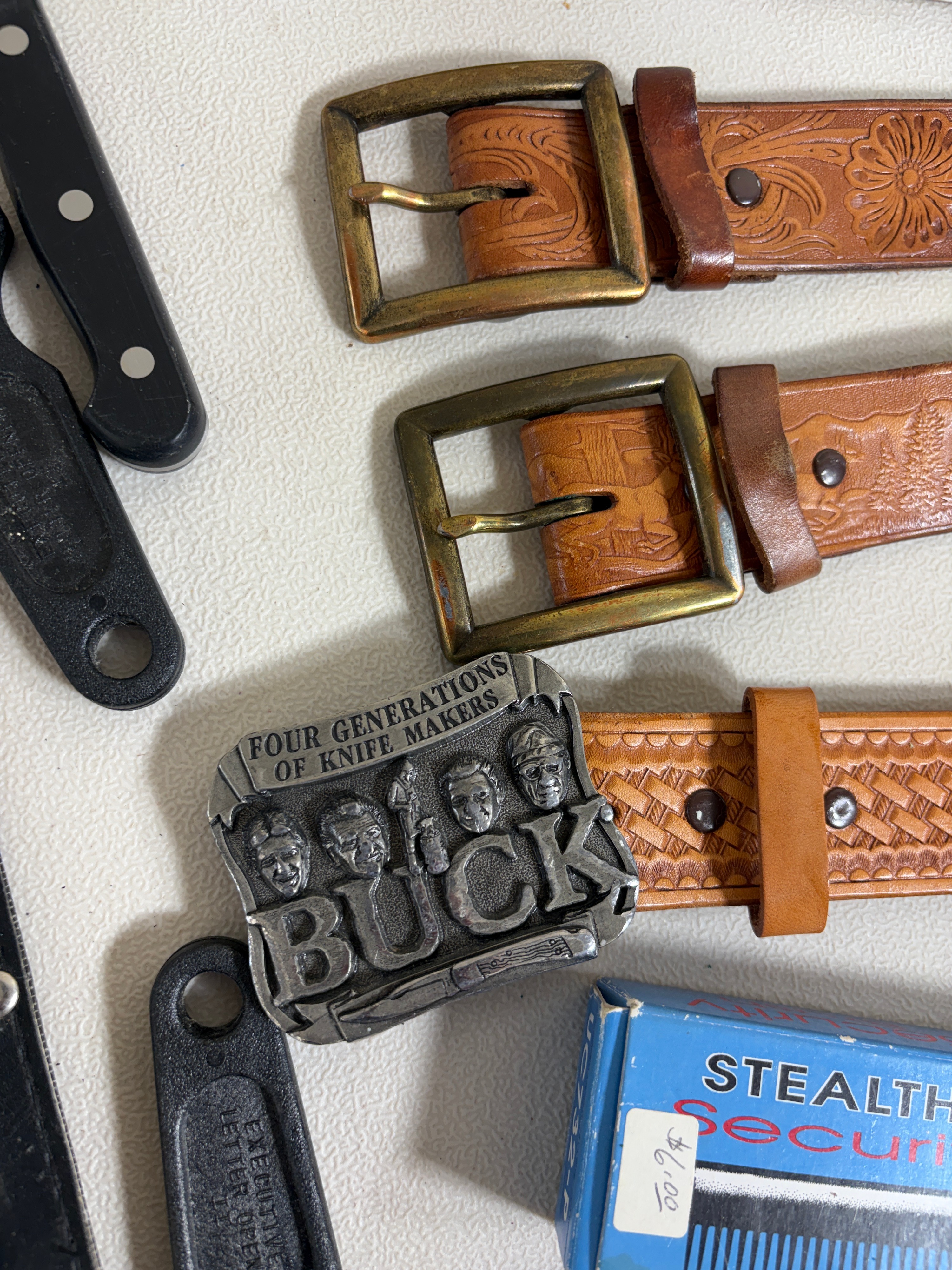 Assorted Hunting and Folding Knives with Tooled Leather Belts and Collectible Case Packaging