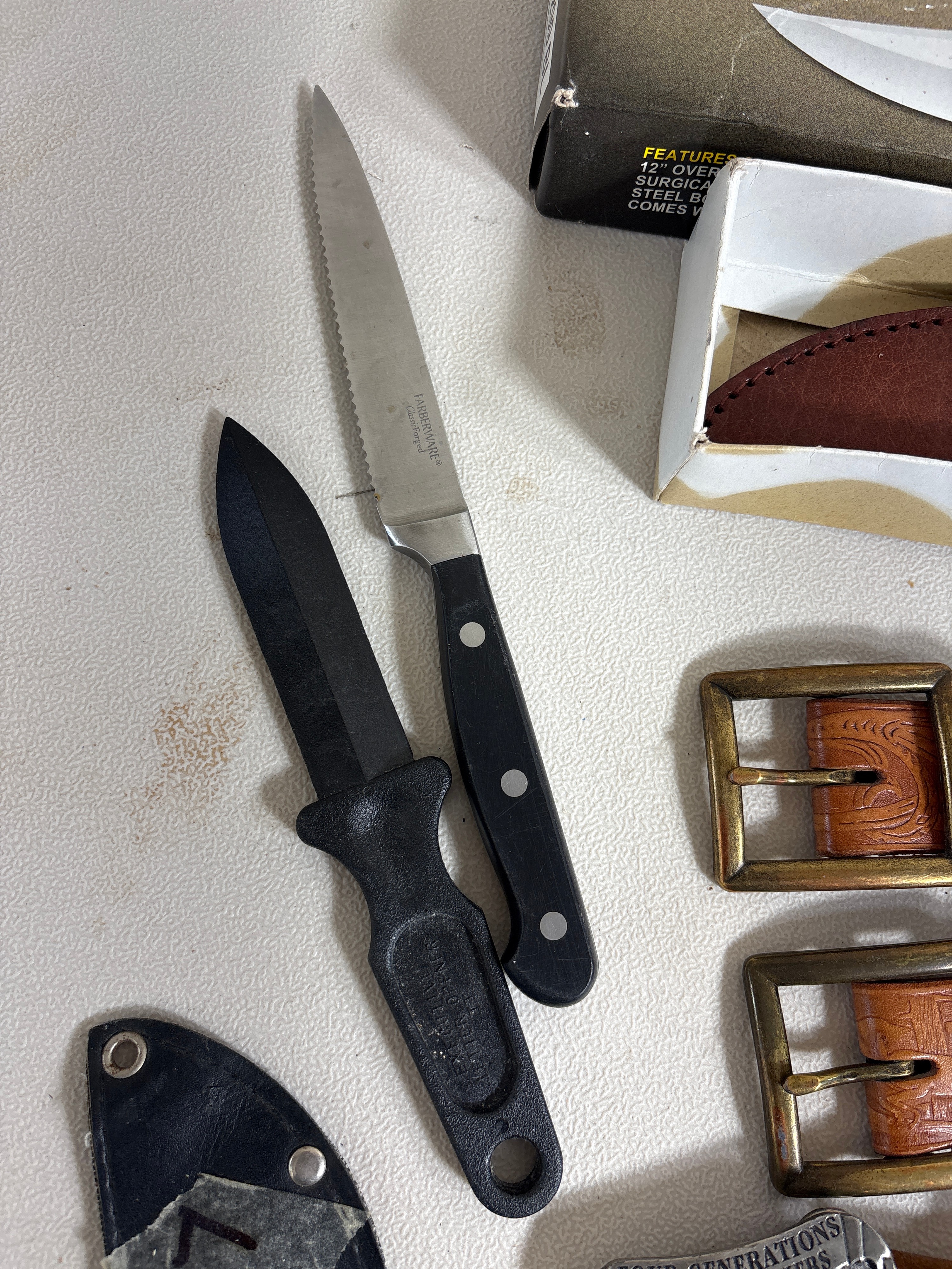Assorted Hunting and Folding Knives with Tooled Leather Belts and Collectible Case Packaging