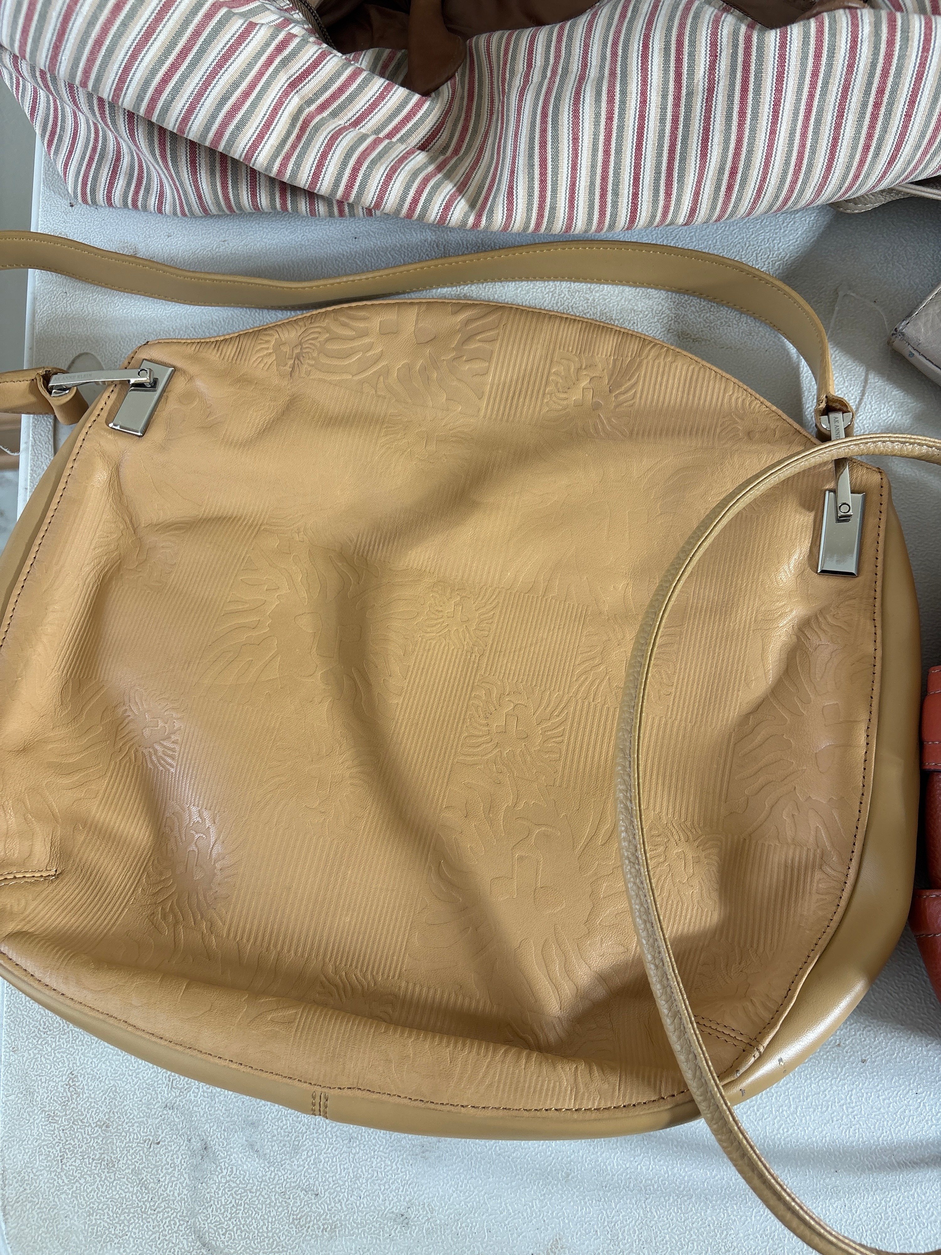 An Assortment of Designer and Contemporary Leather and Fabric Handbags