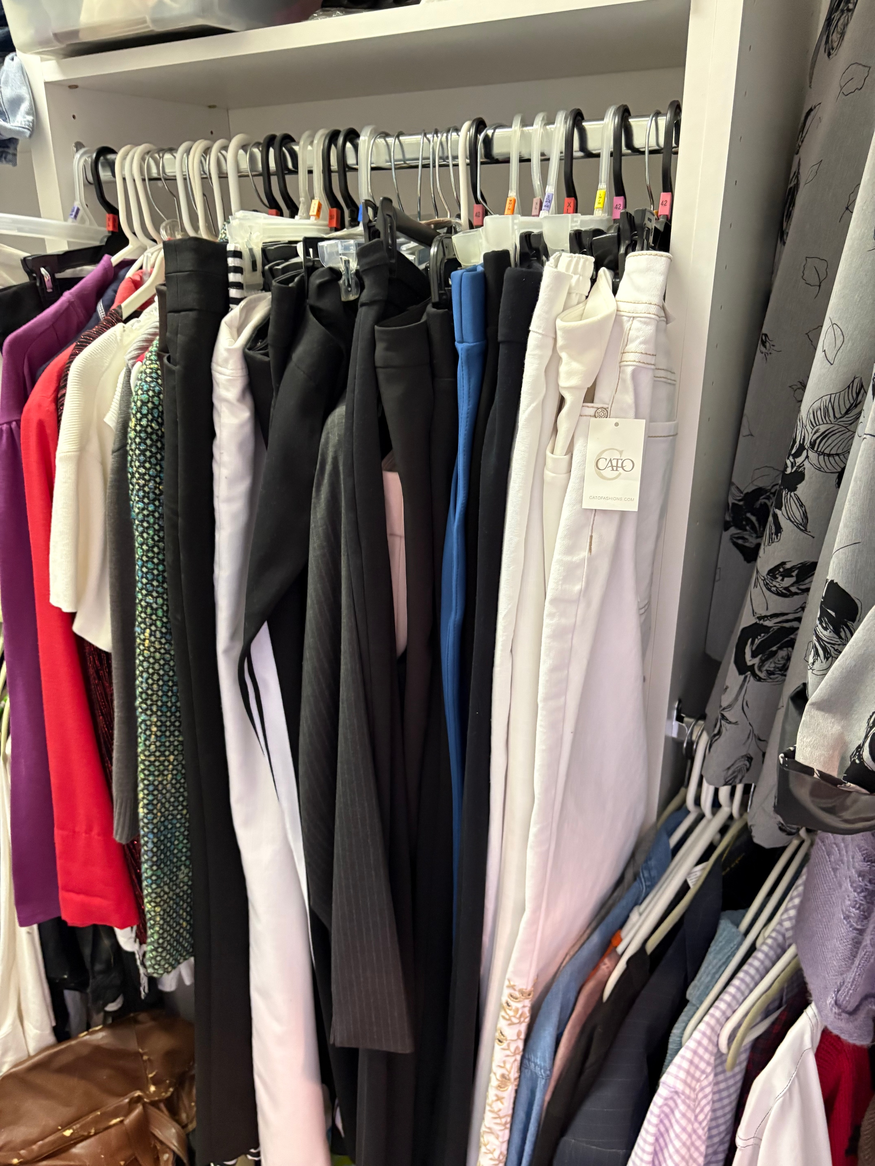 GIANT CONTENTS LOT: An Assortment of Contemporary Women's Apparel, Footwear, Handbags, Board Games, and Toys