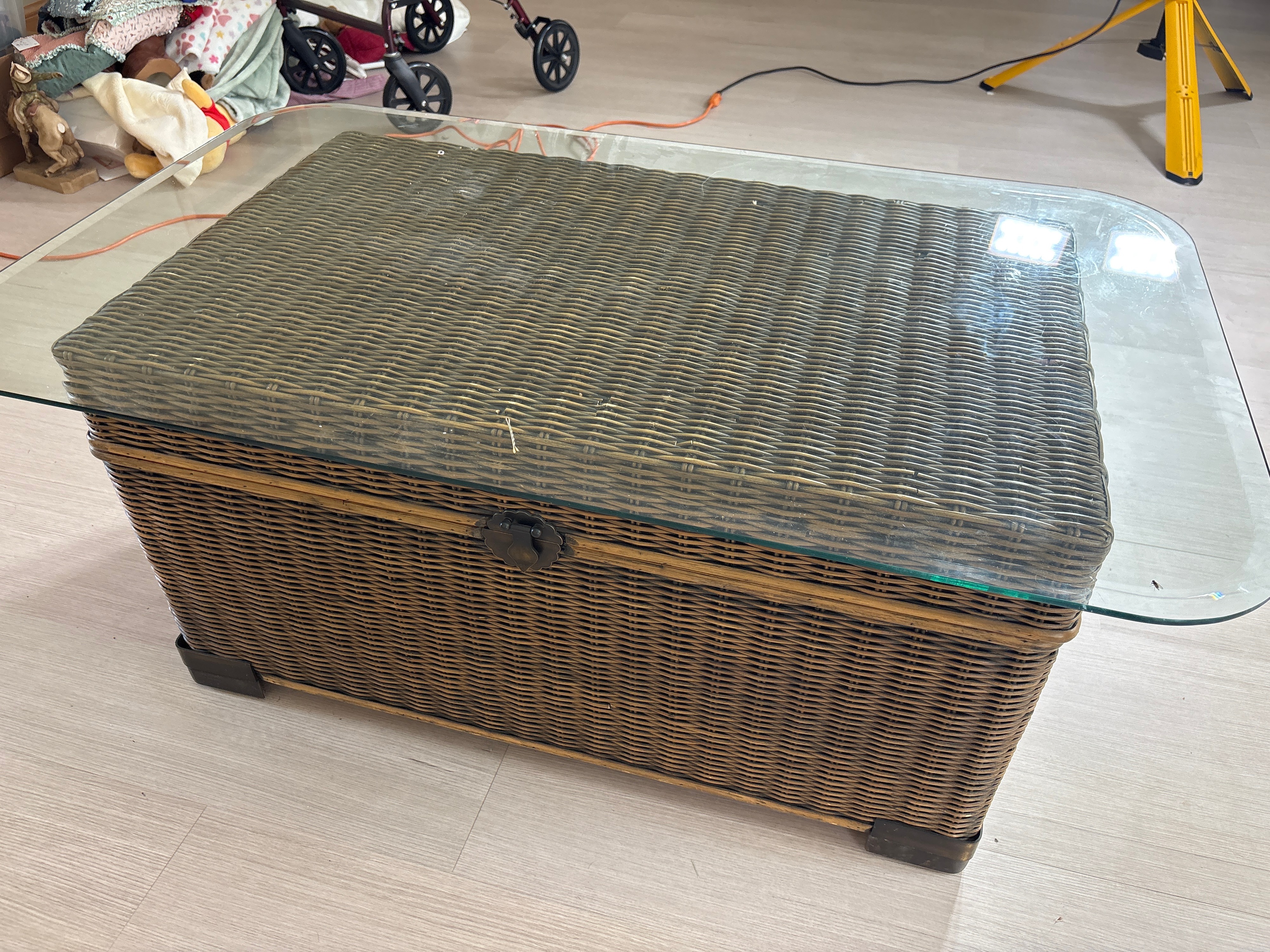 A Collection of Assorted Furniture and Decorative Items Including a Wicker Trunk Coffee Table and Neoclassical Style Tables