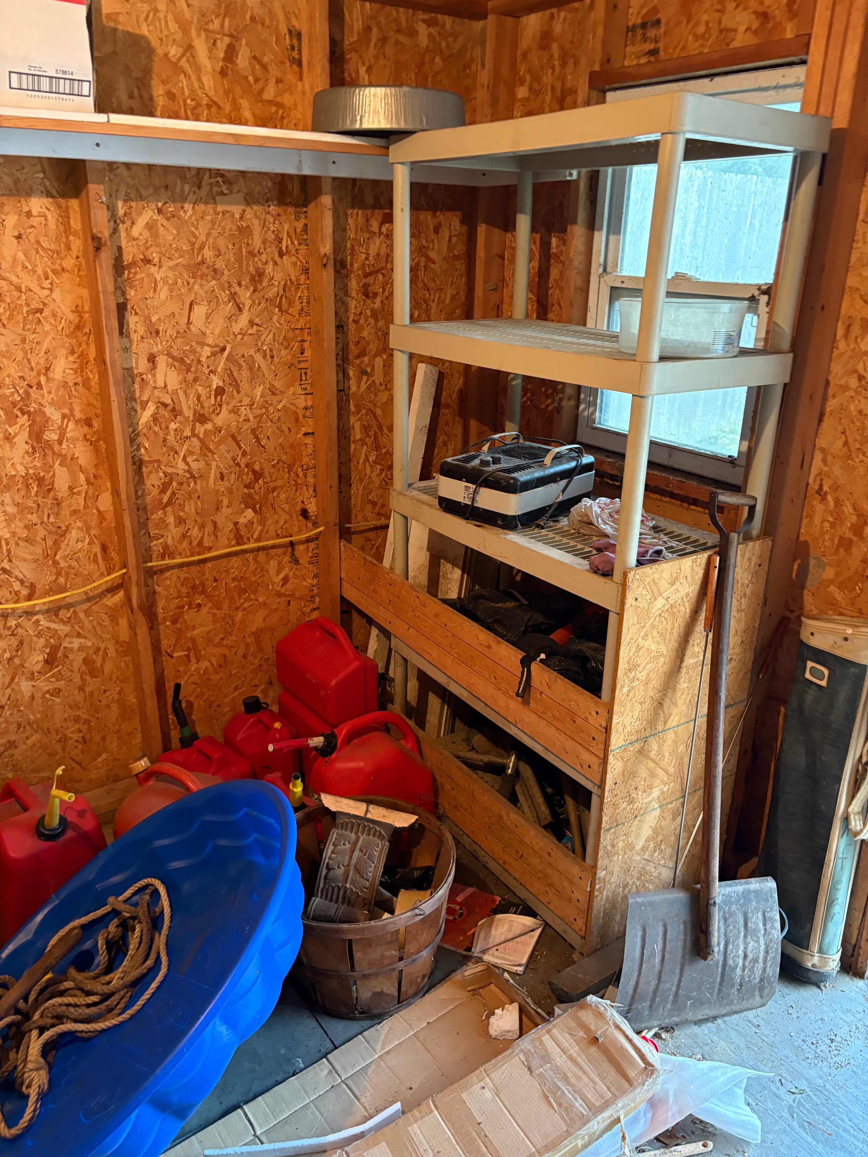A Large Collection of Storage Shed Contents Including a Western Flyer Wagon, Morrell Archery Target, Shelving Units, and Garden Equipment