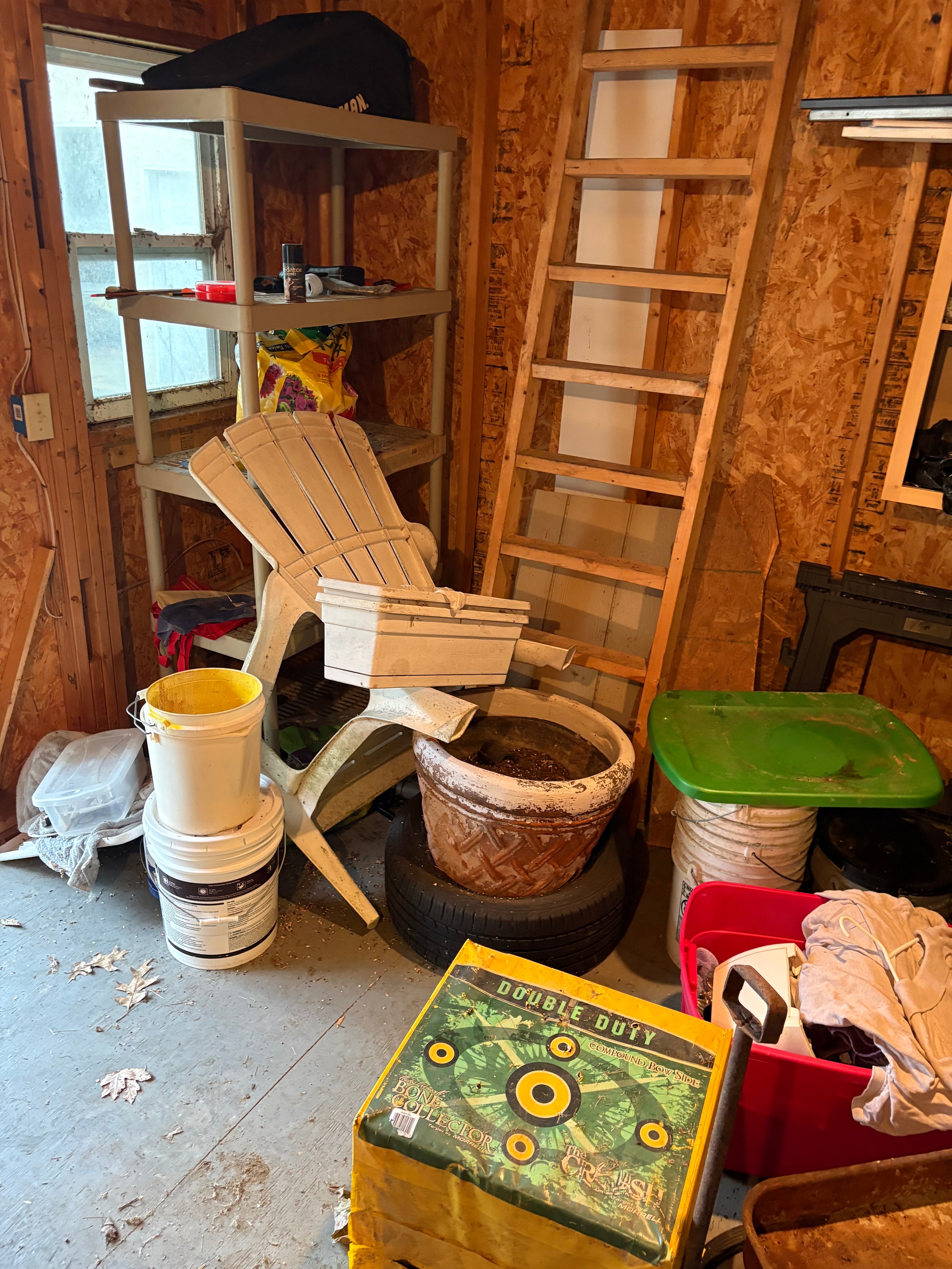 A Large Collection of Storage Shed Contents Including a Western Flyer Wagon, Morrell Archery Target, Shelving Units, and Garden Equipment