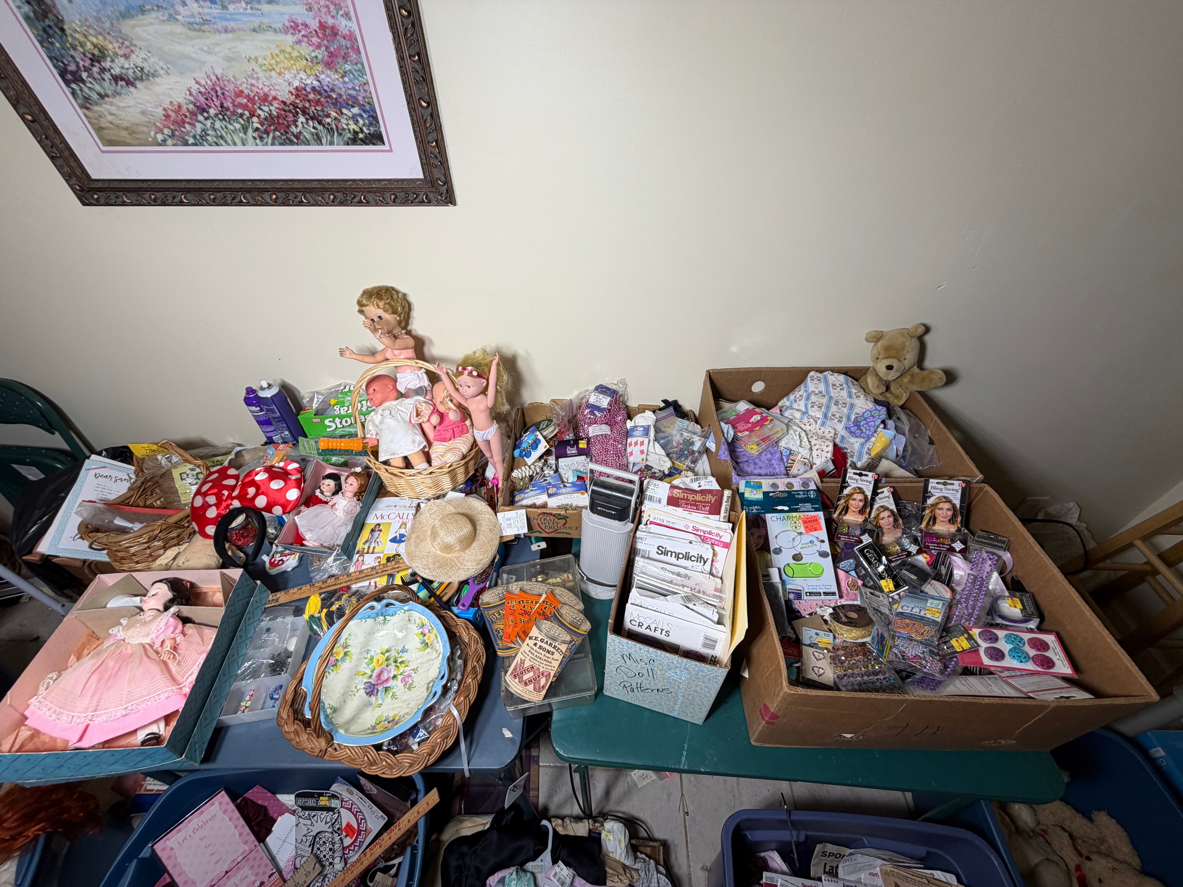 CONTENTS LOT: A Large Collection of Cabbage Patch Kids, American Girl, and Barbie Dolls with Sewing Patterns, Craft Kits, and Trims