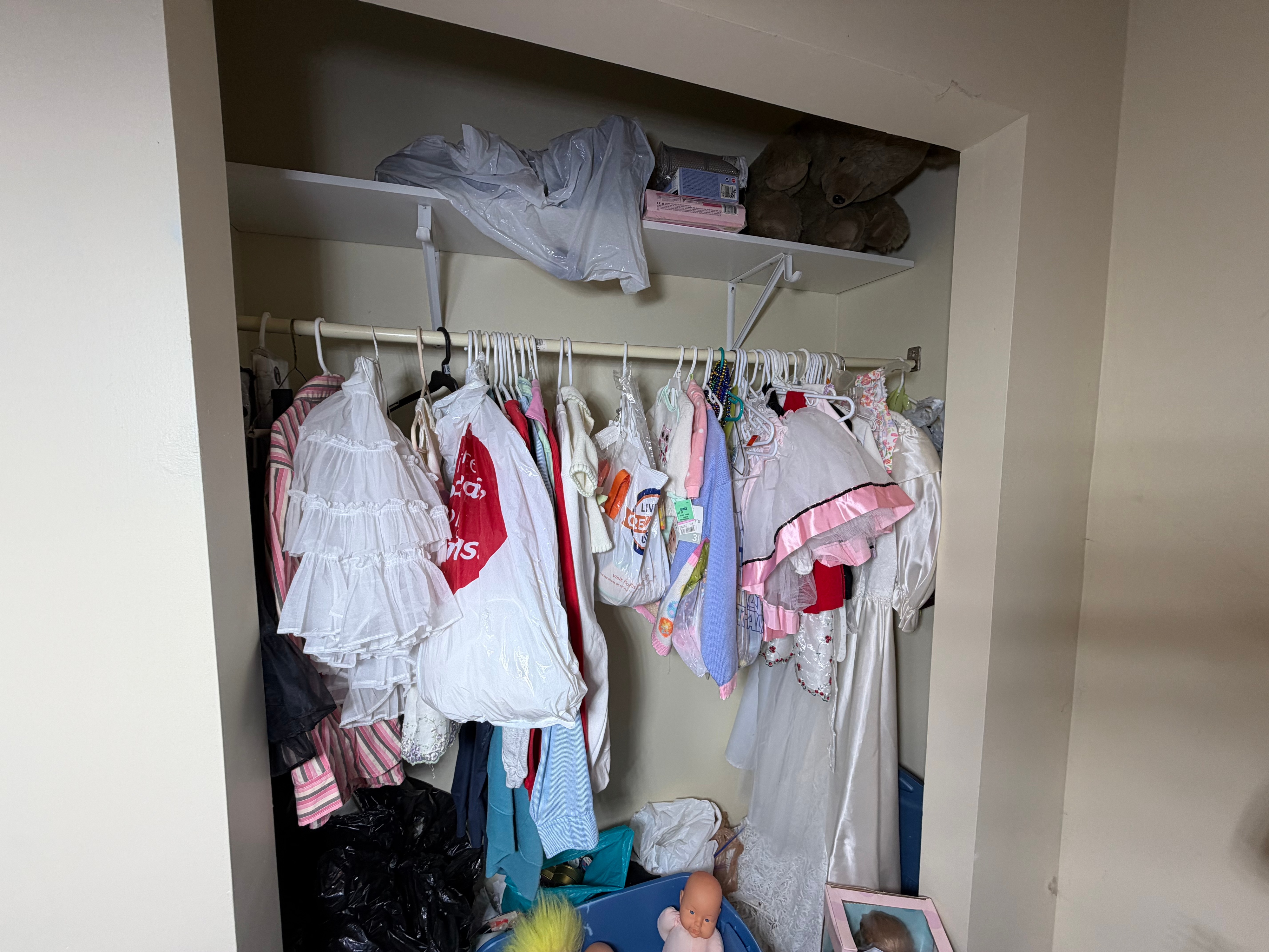 CONTENTS LOT: A Large Collection of Cabbage Patch Kids, American Girl, and Barbie Dolls with Sewing Patterns, Craft Kits, and Trims