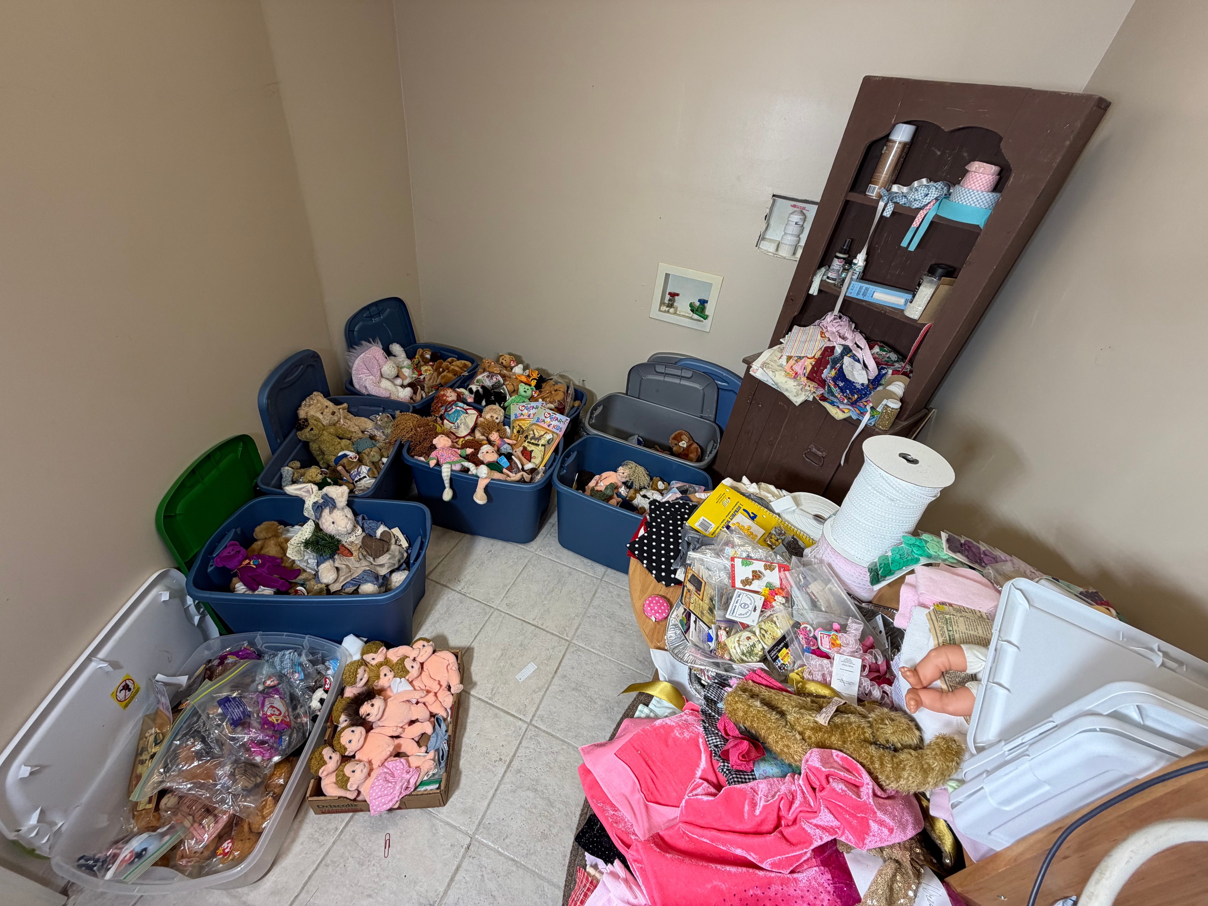 An Assortment of Ty Inc. Plush Toys, Beanie Kids Dolls, and Retail Craft Notions