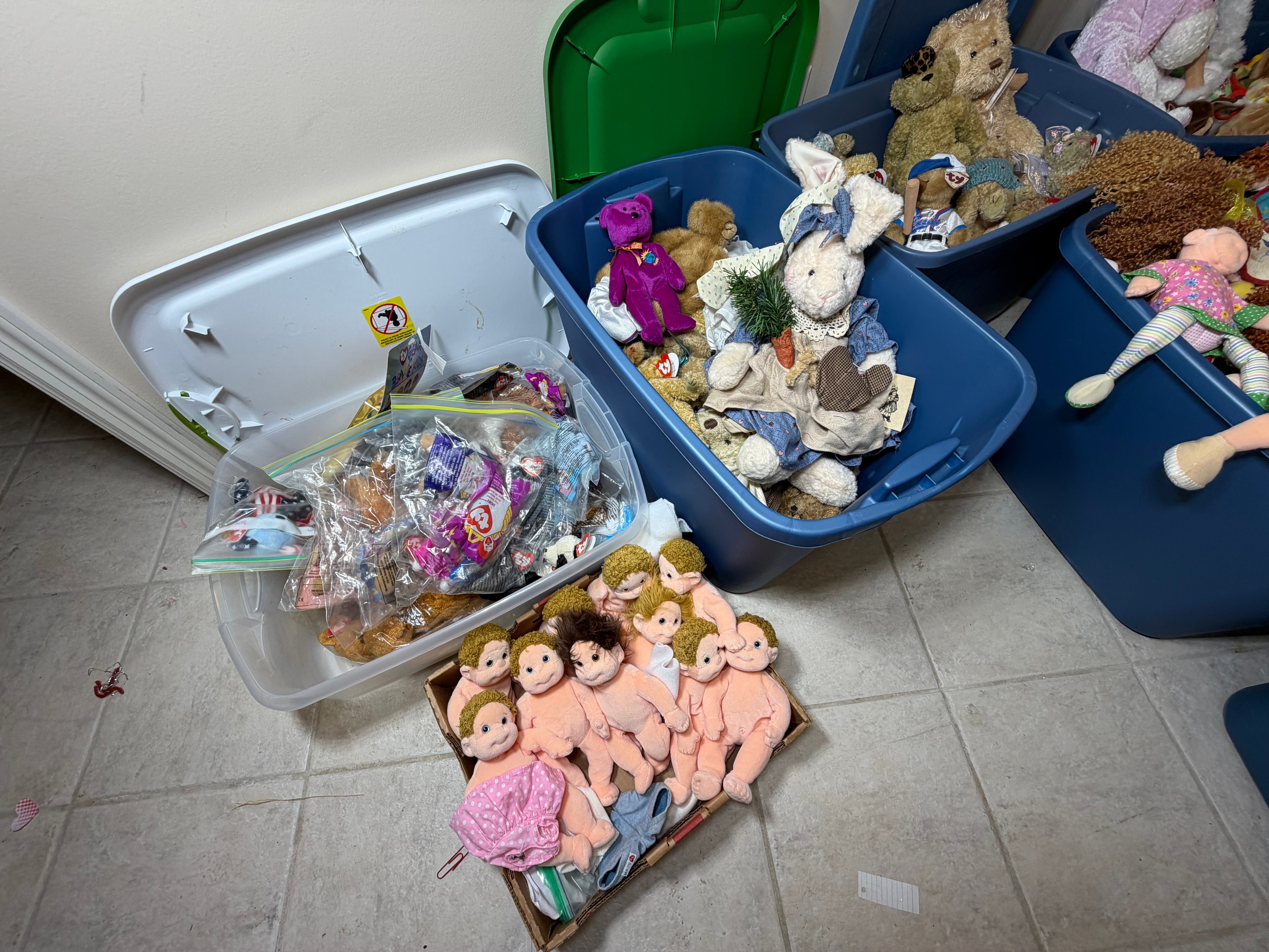 An Assortment of Ty Inc. Plush Toys, Beanie Kids Dolls, and Retail Craft Notions