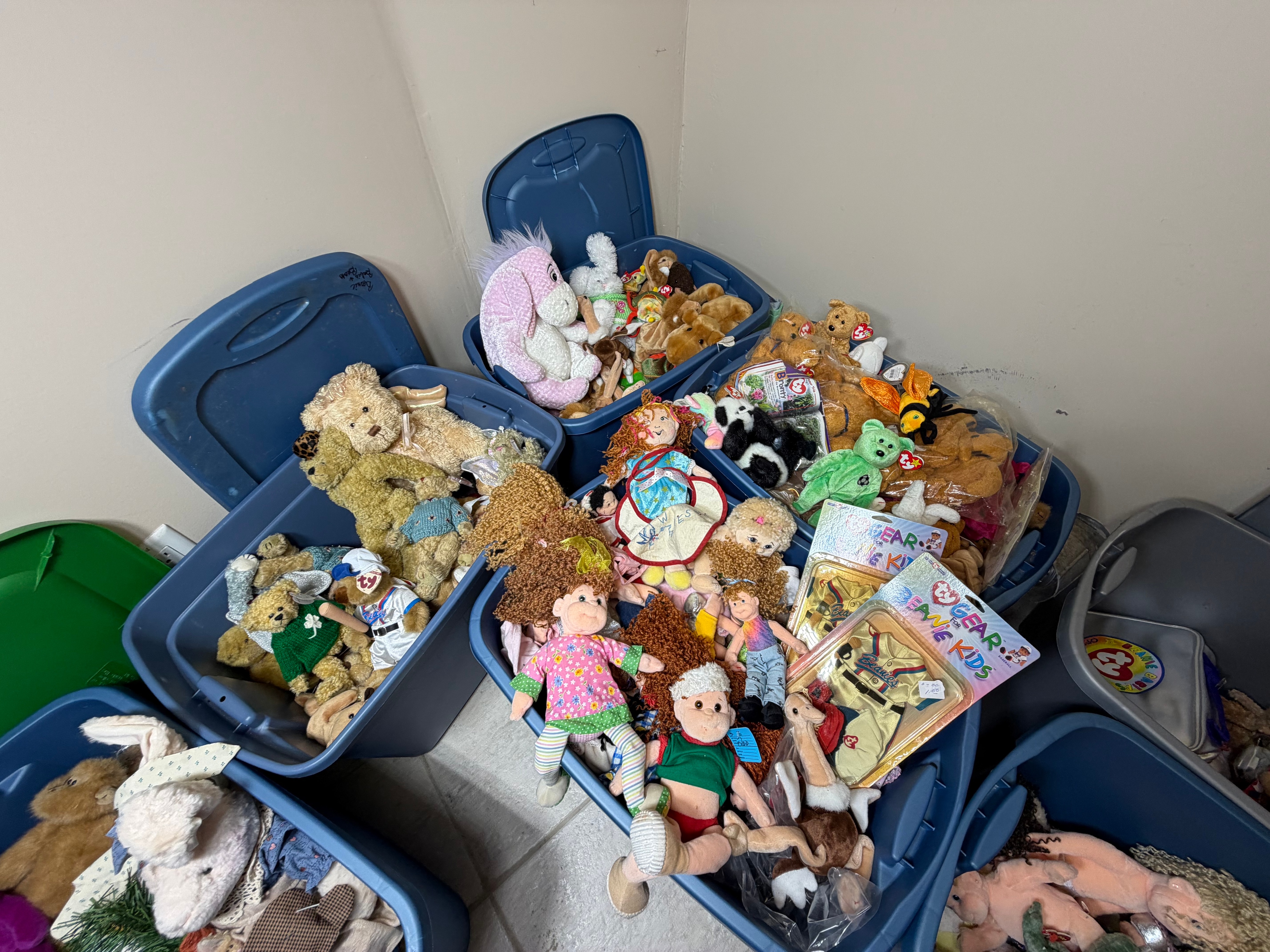 An Assortment of Ty Inc. Plush Toys, Beanie Kids Dolls, and Retail Craft Notions