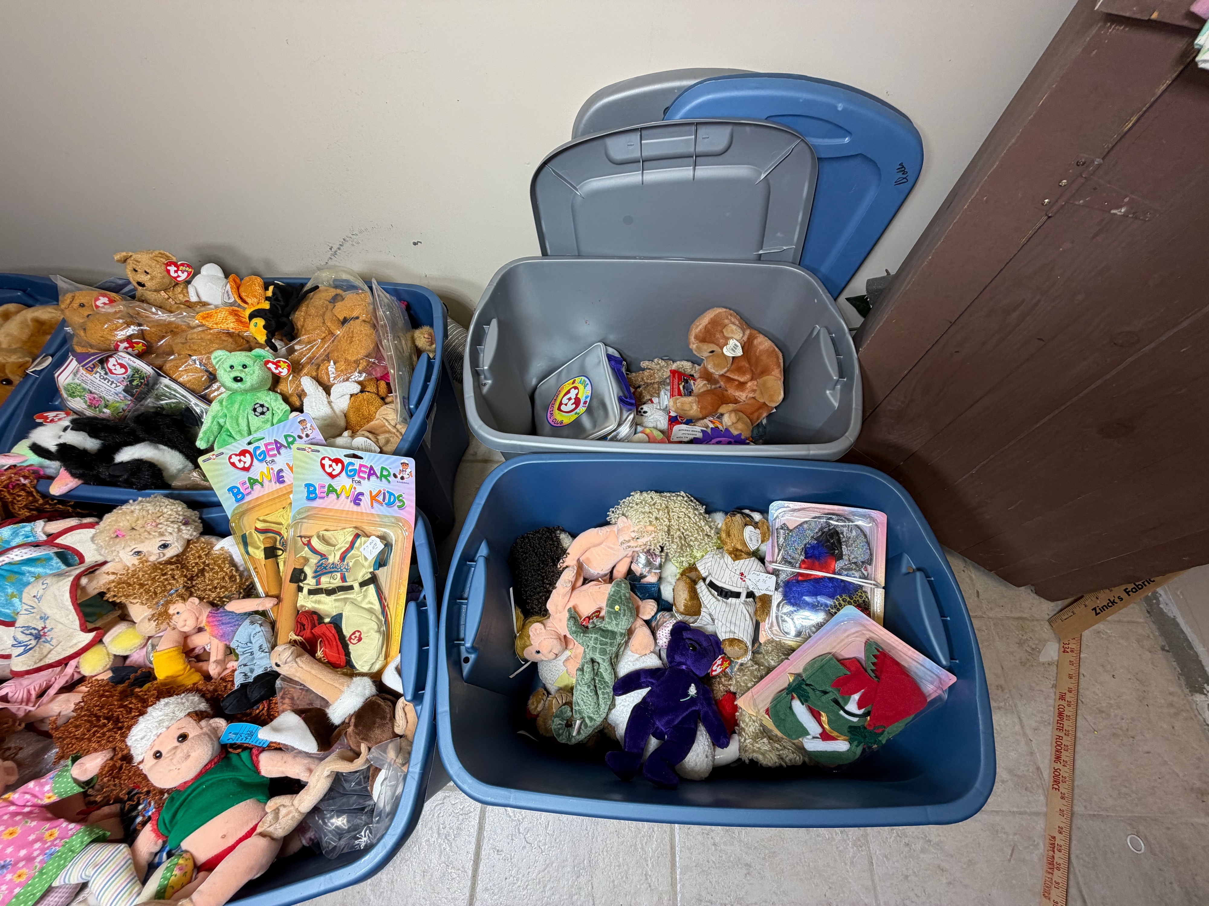 An Assortment of Ty Inc. Plush Toys, Beanie Kids Dolls, and Retail Craft Notions