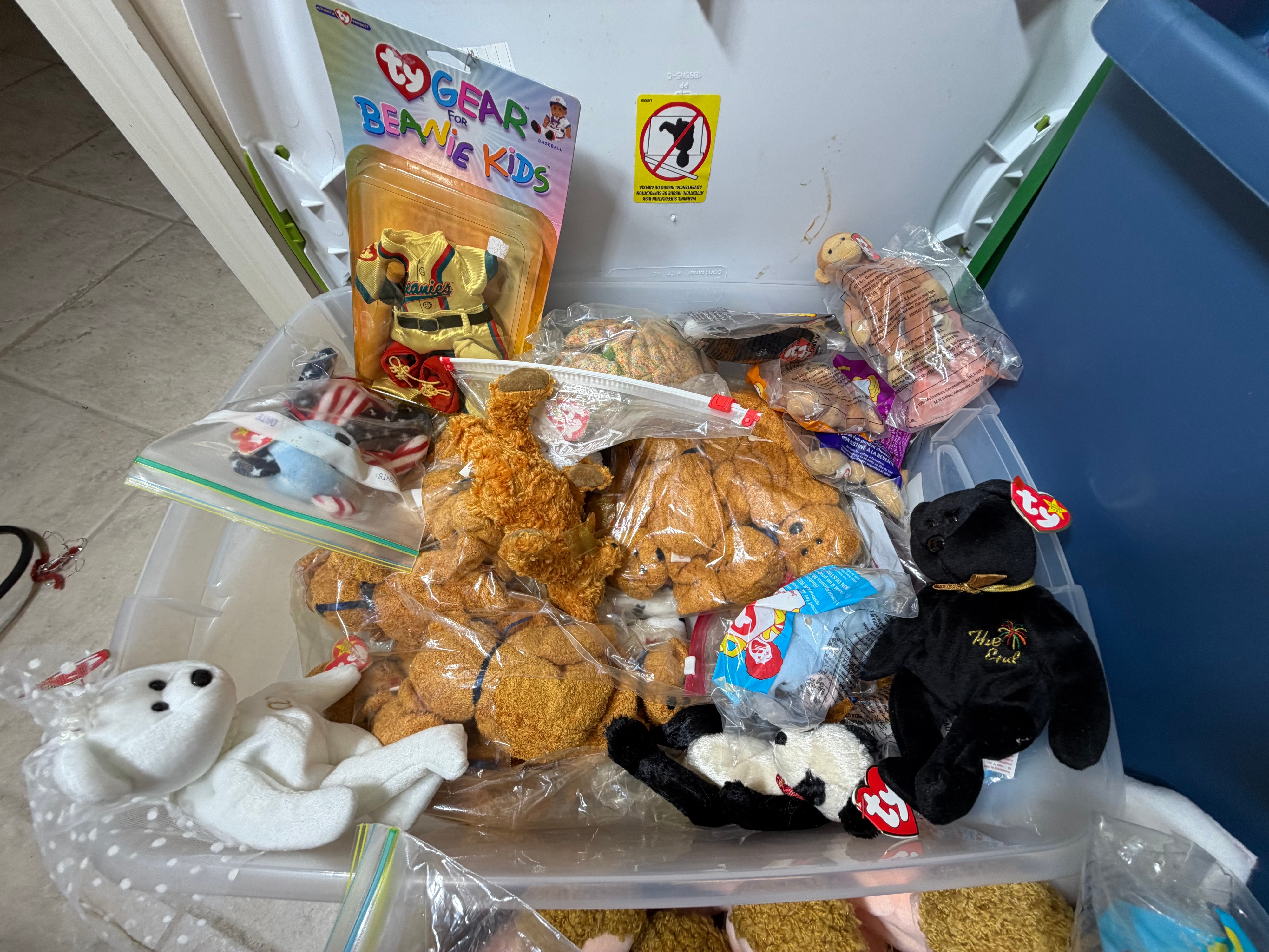 An Assortment of Ty Inc. Plush Toys, Beanie Kids Dolls, and Retail Craft Notions