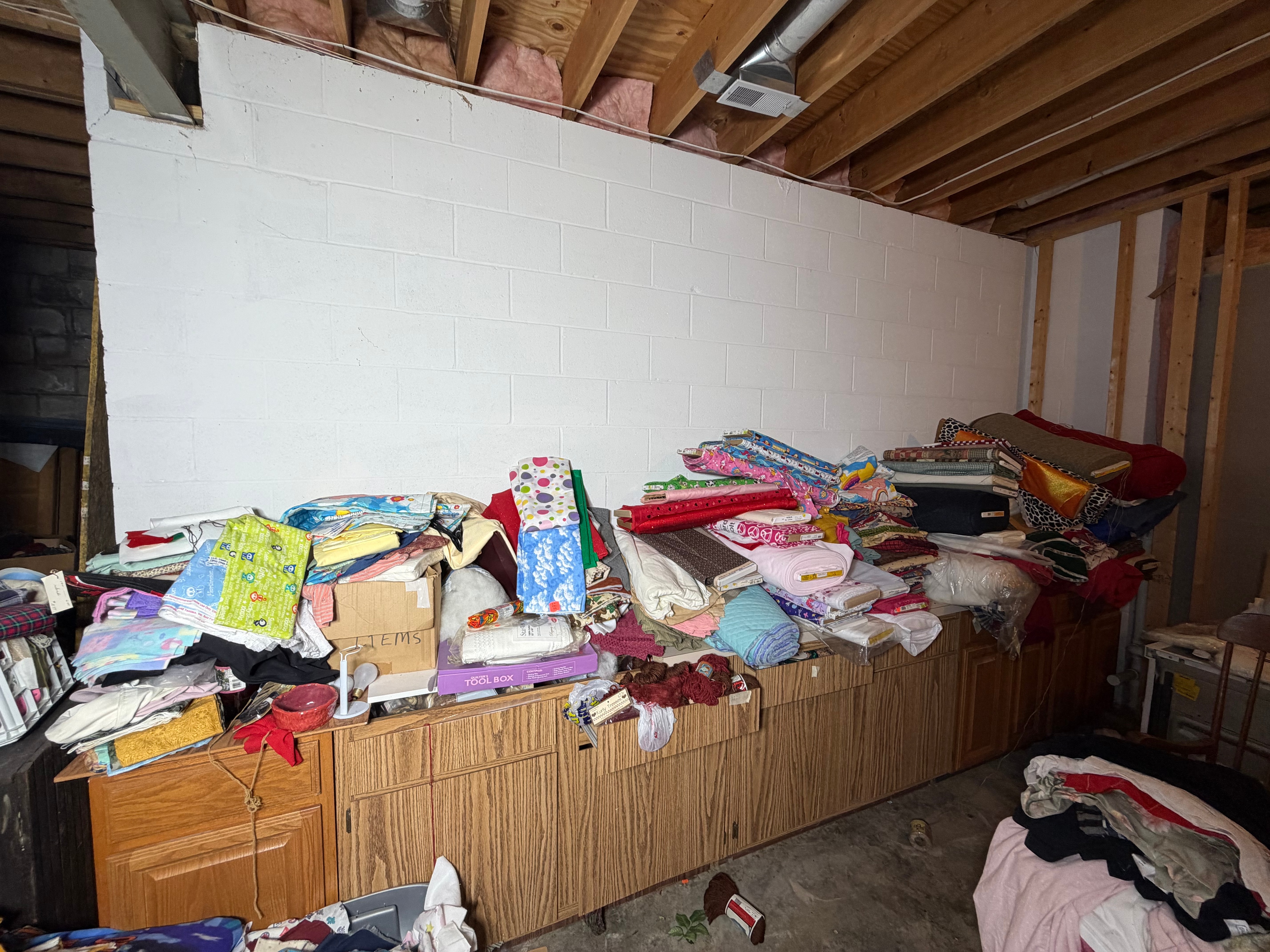 CONTENTS LOT: A Massive Collection of Sewing and Craft Supplies, Antique Furniture, and Household Goods