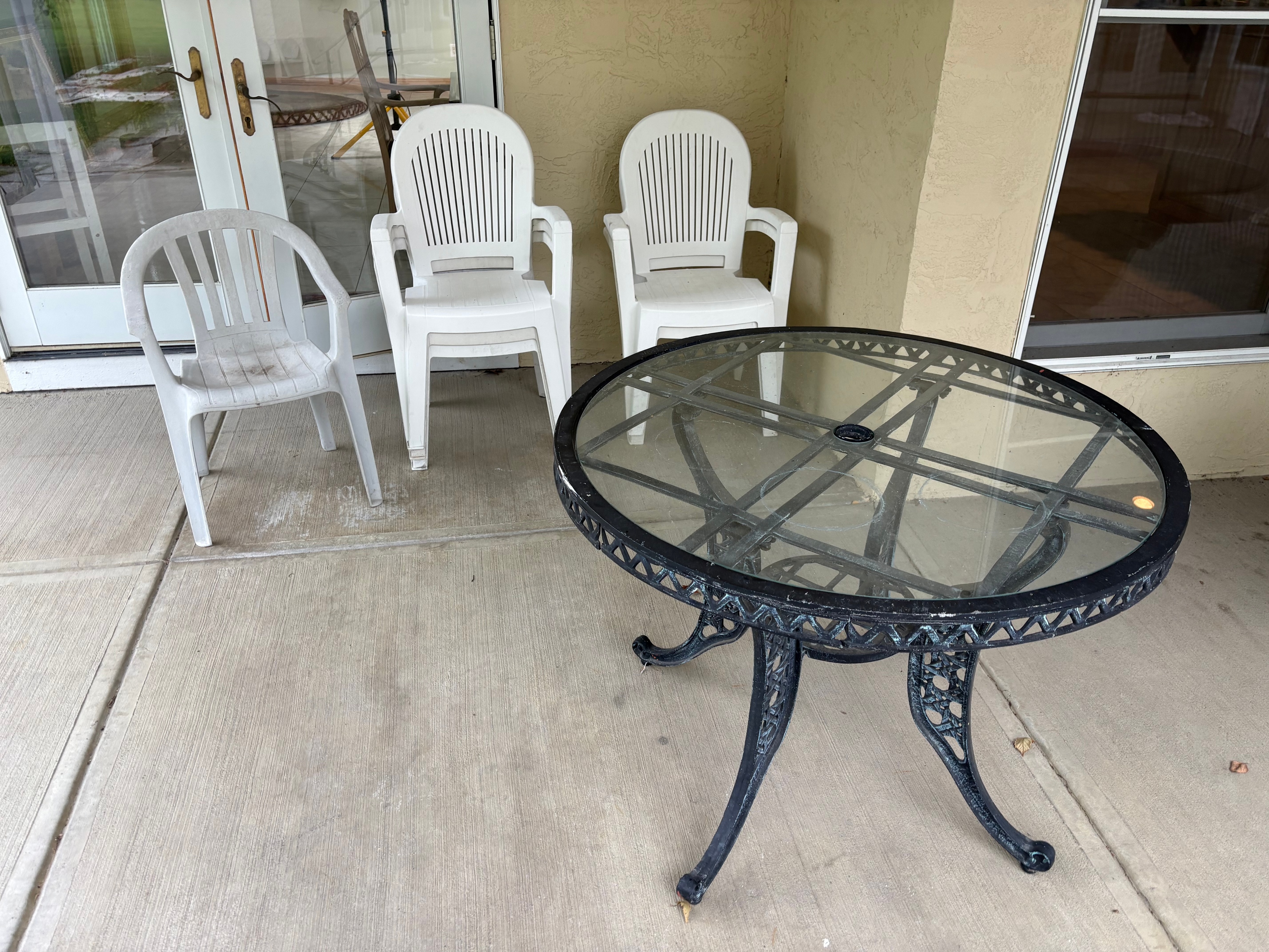 A Collection of Outdoor Patio Furniture Garden Statuary and Planters