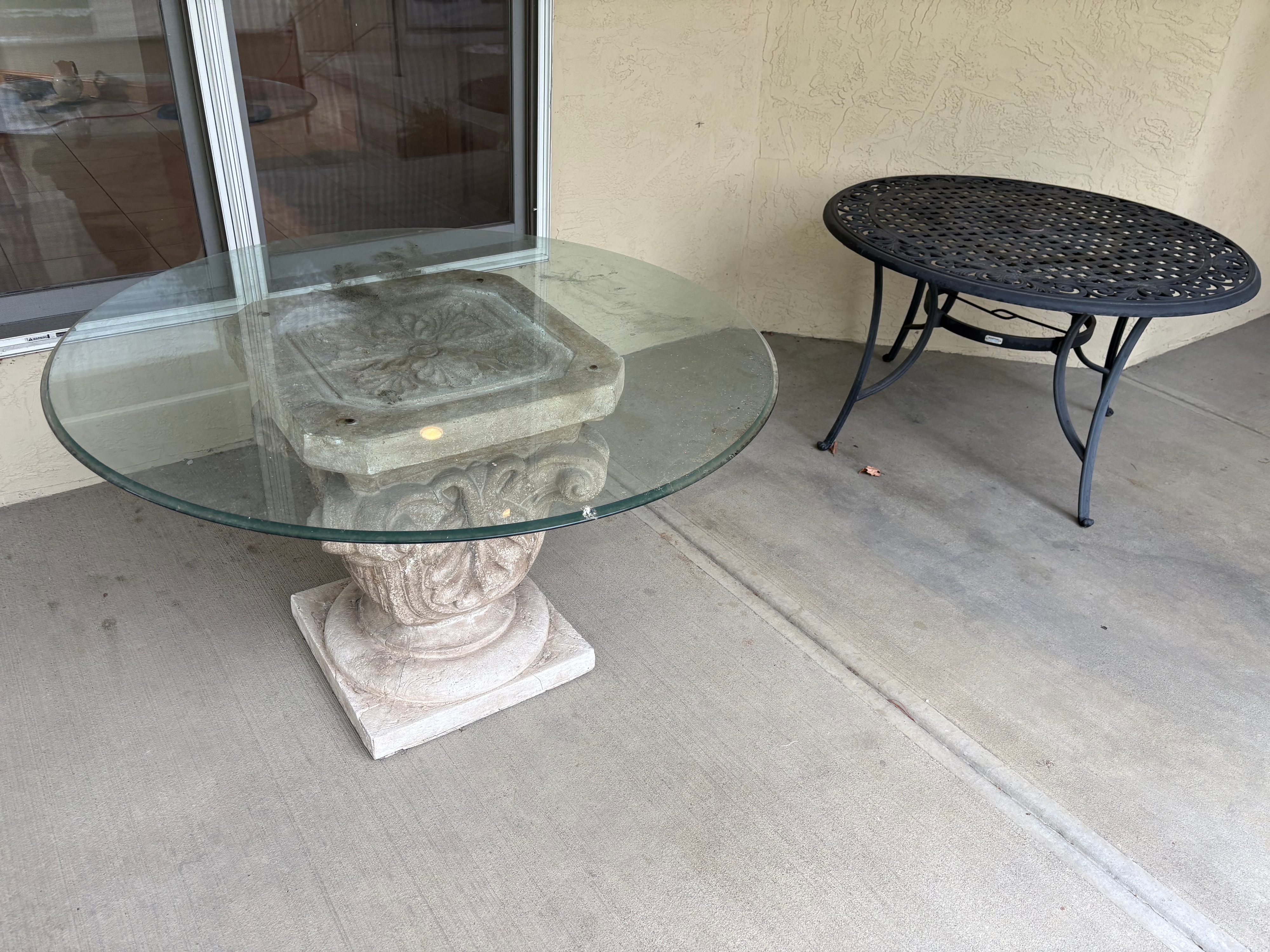 A Collection of Outdoor Patio Furniture Garden Statuary and Planters