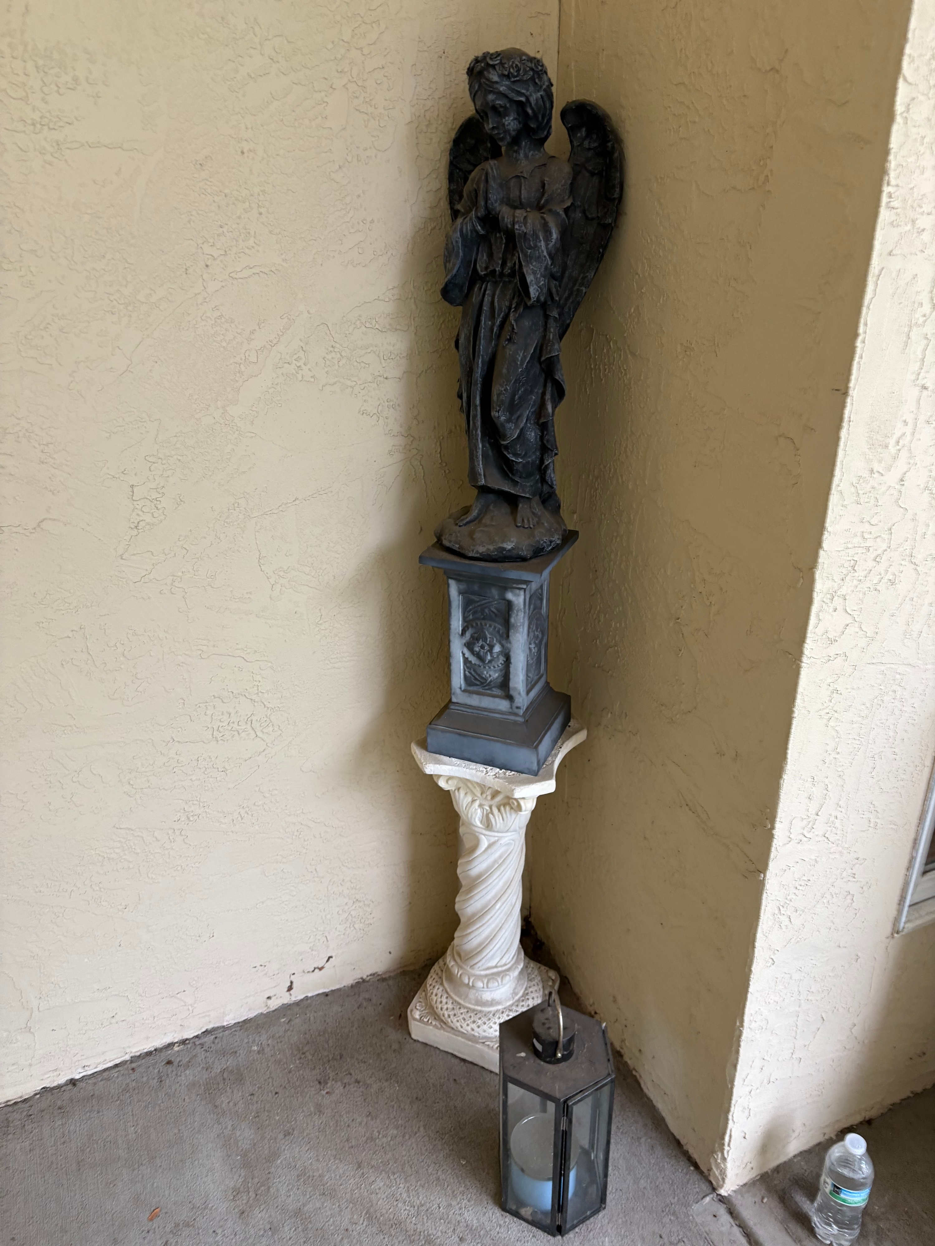 A Collection of Outdoor Patio Furniture Garden Statuary and Planters
