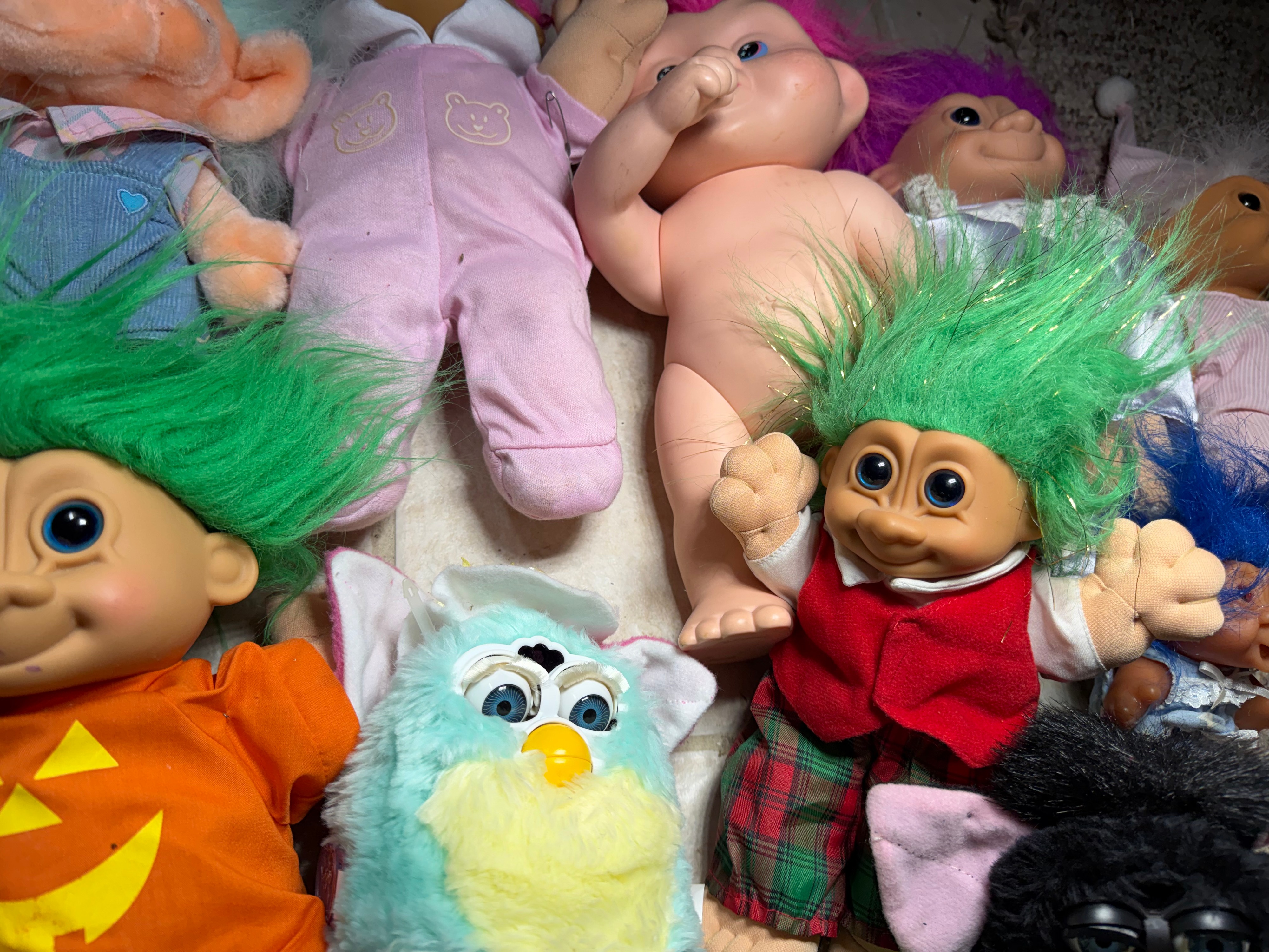 A Collection of Vintage 1990s Tiger Electronics Furby Toys and Assorted Troll Dolls